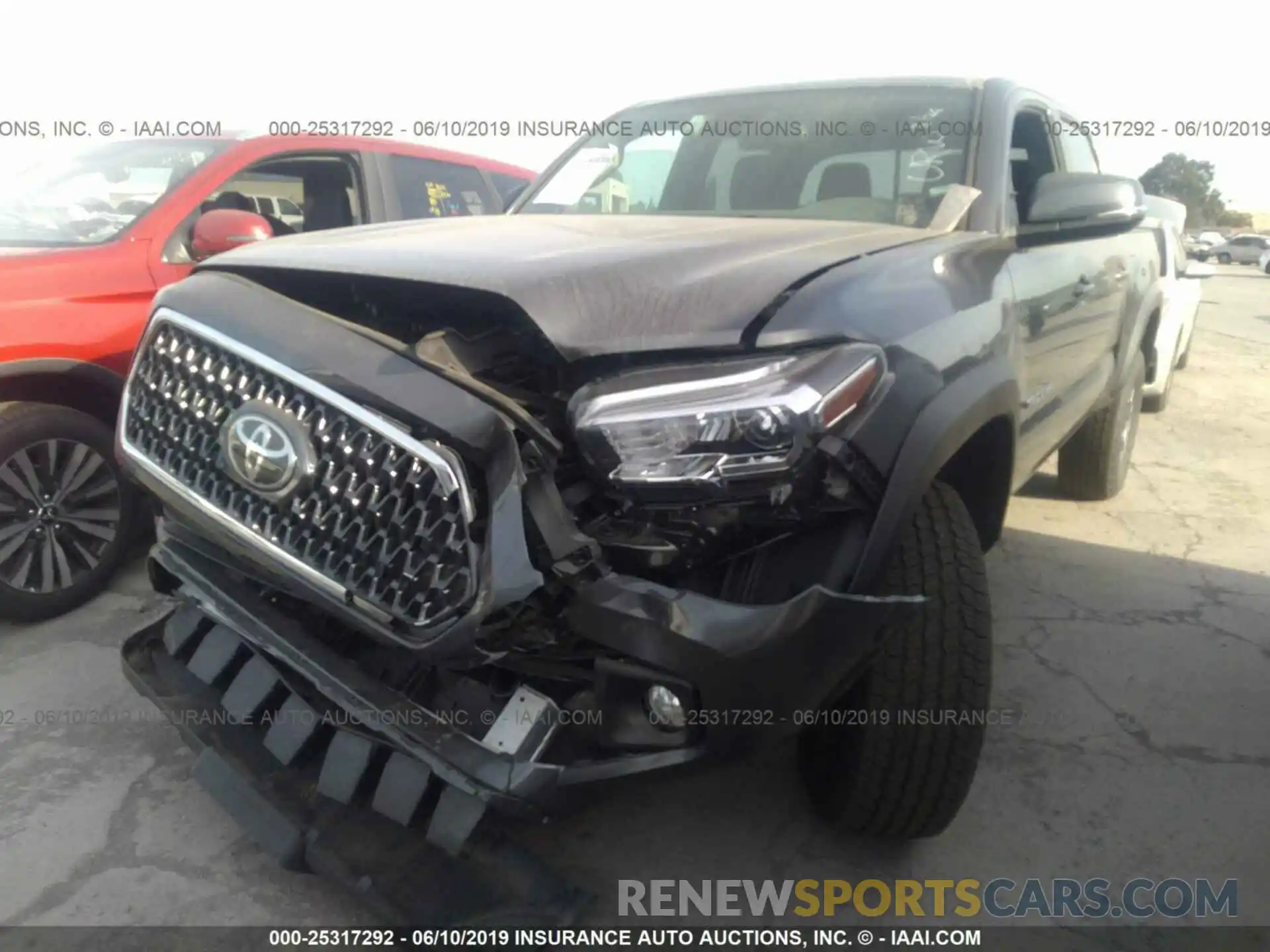 2 Photograph of a damaged car 3TMCZ5ANXKM246404 TOYOTA TACOMA 2019