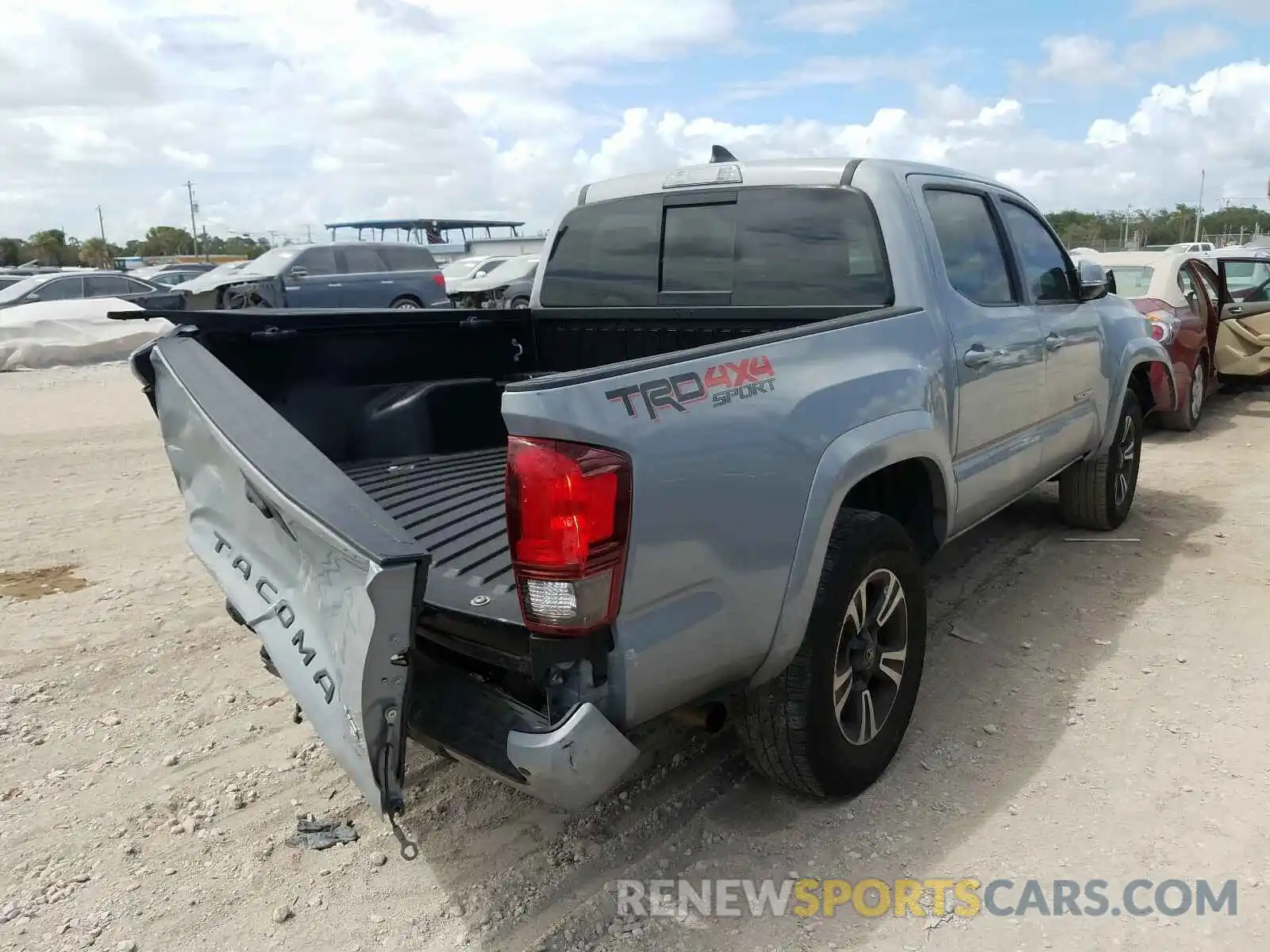 4 Photograph of a damaged car 3TMCZ5ANXKM247844 TOYOTA TACOMA 2019