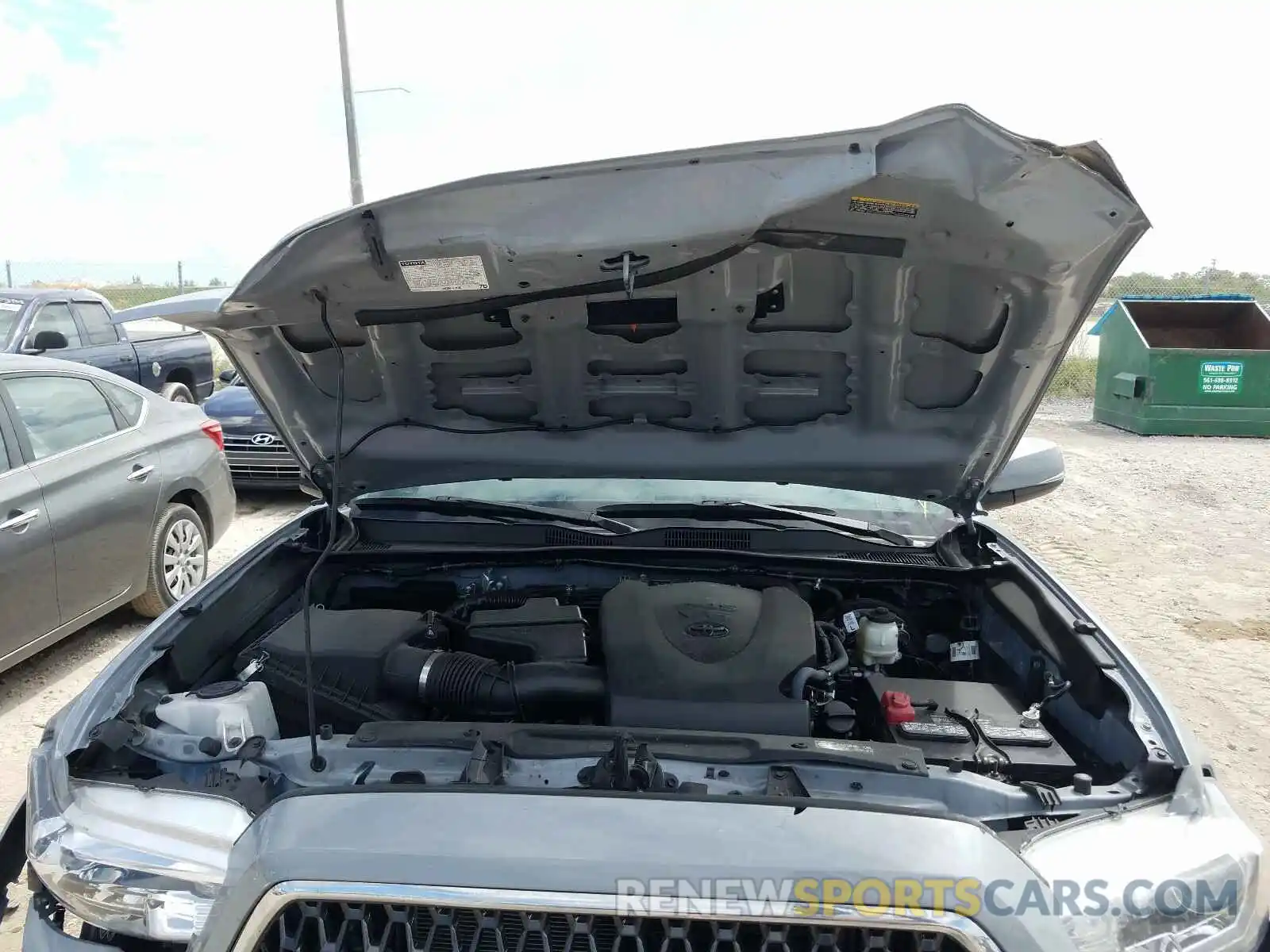 7 Photograph of a damaged car 3TMCZ5ANXKM247844 TOYOTA TACOMA 2019