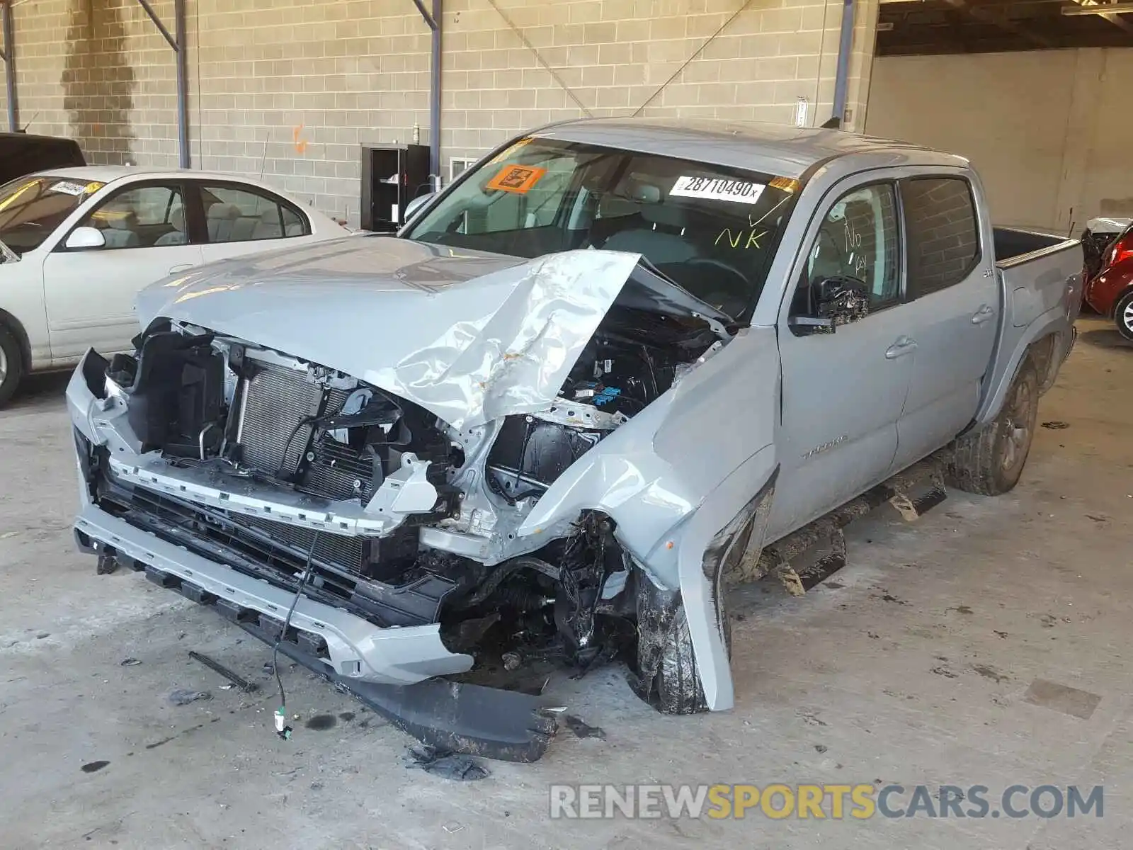 2 Photograph of a damaged car 3TMCZ5ANXKM249187 TOYOTA TACOMA 2019