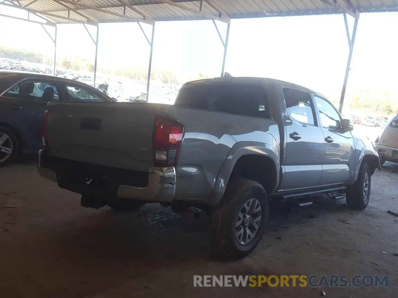 4 Photograph of a damaged car 3TMCZ5ANXKM249187 TOYOTA TACOMA 2019