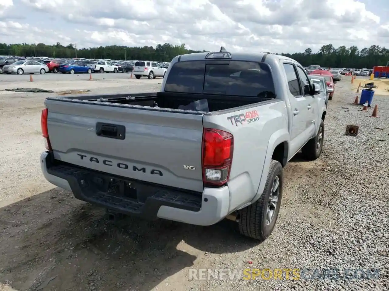 4 Photograph of a damaged car 3TMCZ5ANXKM257676 TOYOTA TACOMA 2019