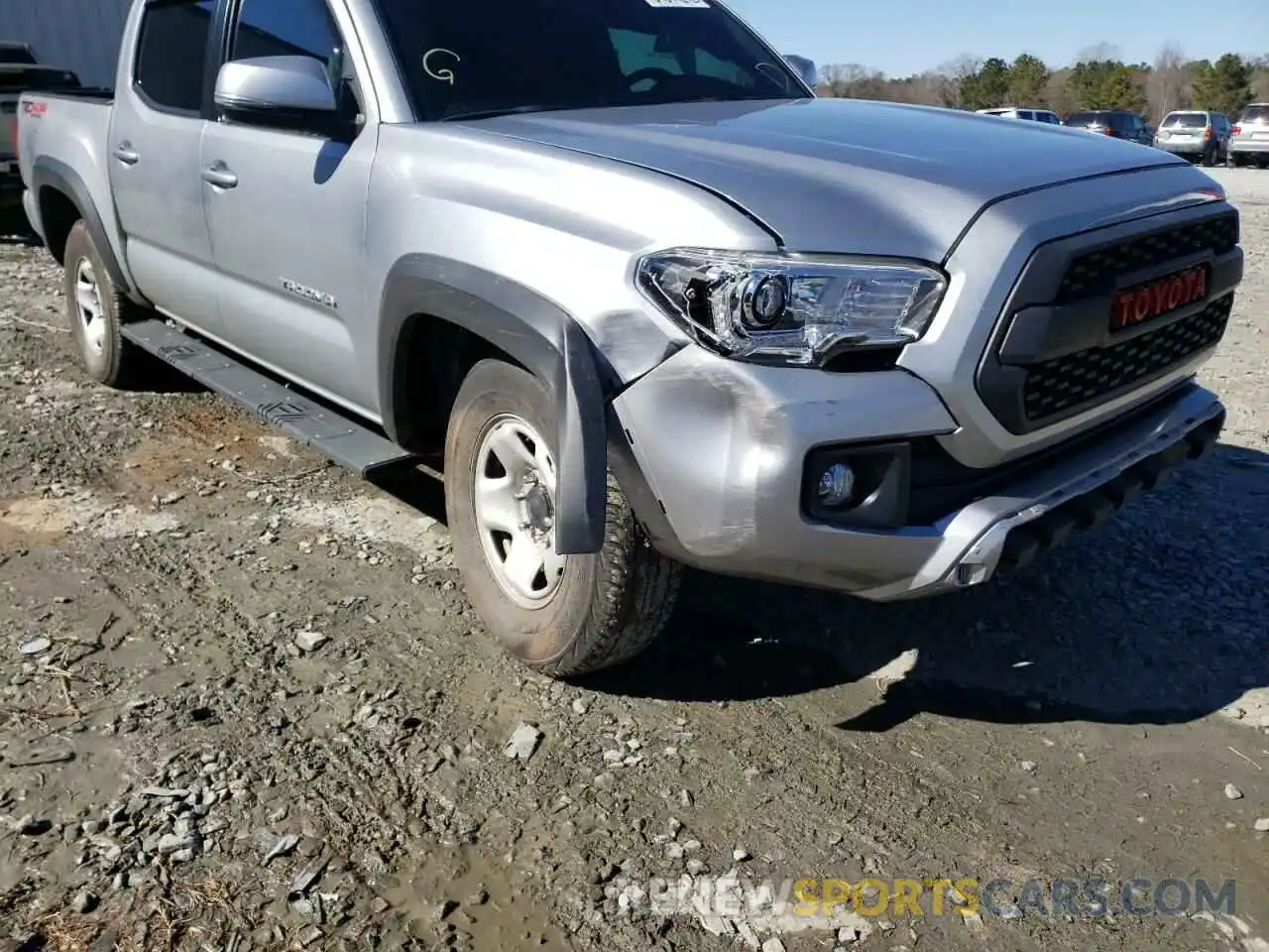 9 Photograph of a damaged car 3TMCZ5ANXKM261484 TOYOTA TACOMA 2019