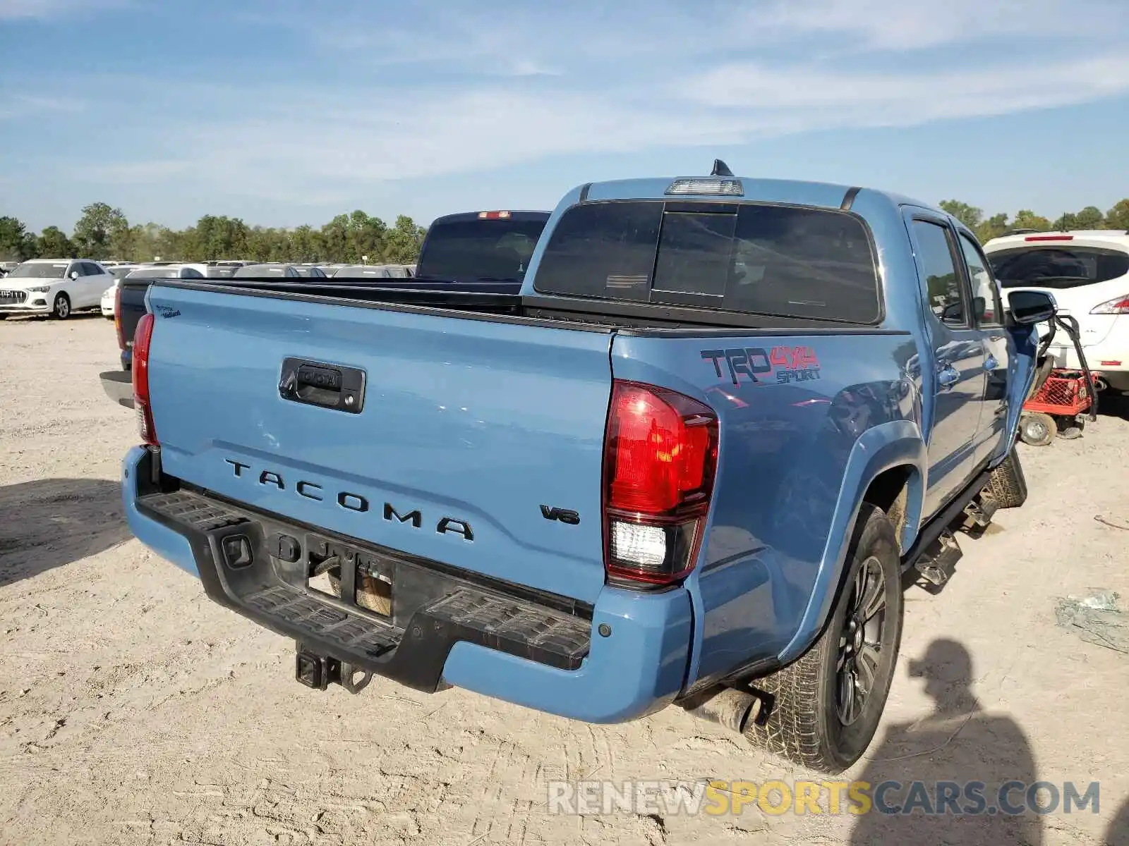 4 Photograph of a damaged car 3TMCZ5ANXKM267009 TOYOTA TACOMA 2019