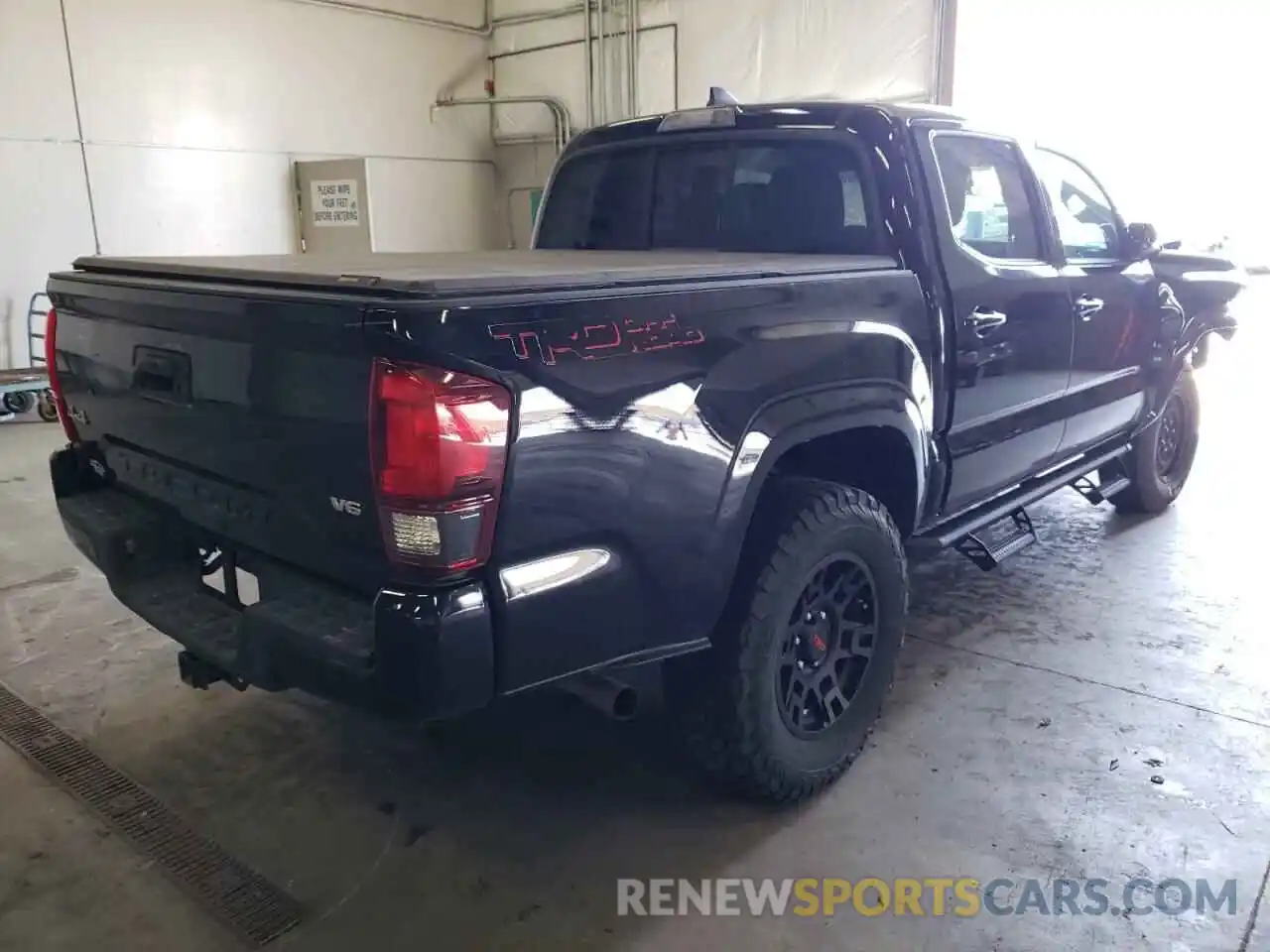 4 Photograph of a damaged car 3TMCZ5ANXKM269083 TOYOTA TACOMA 2019