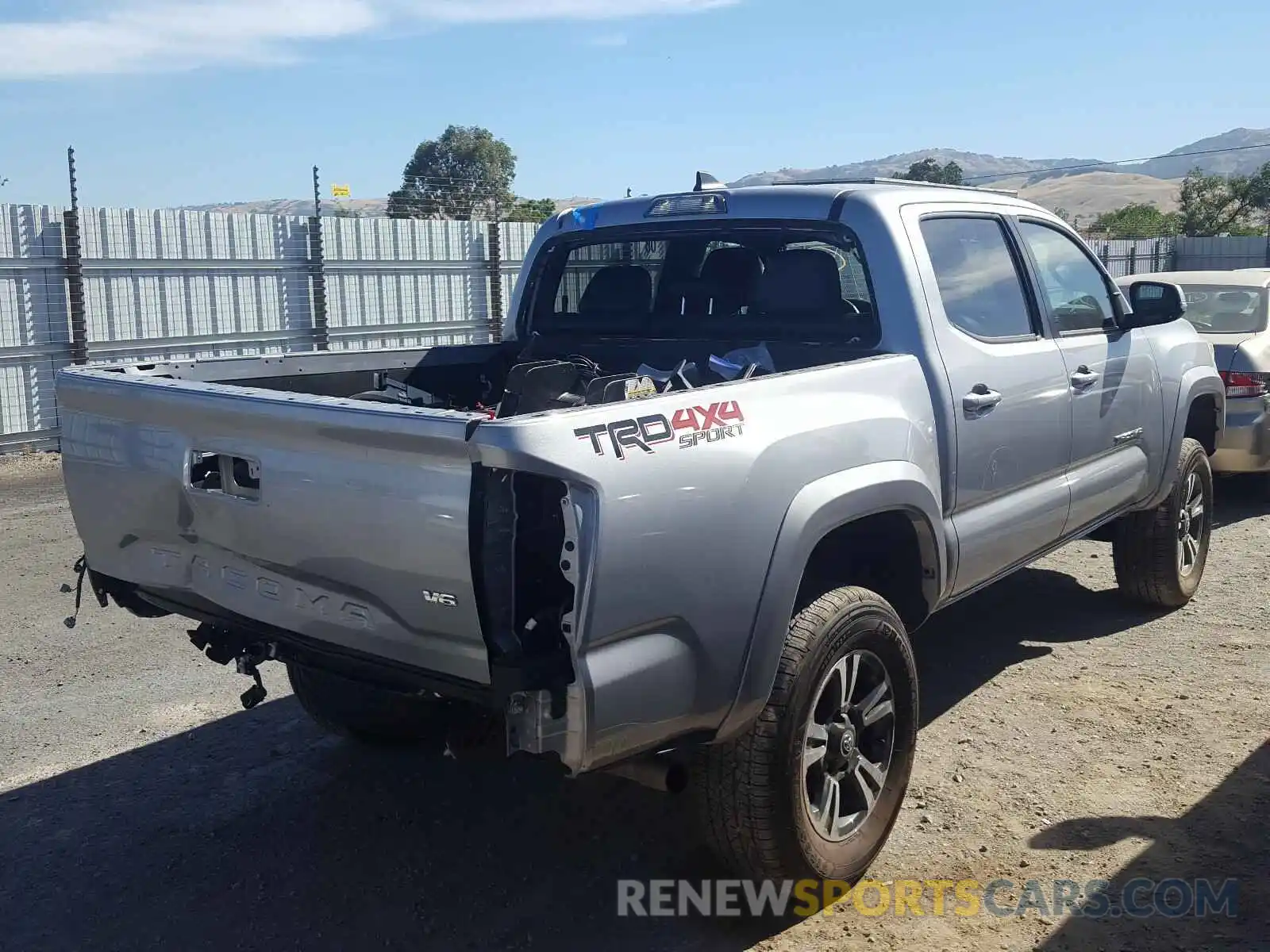 4 Photograph of a damaged car 3TMCZ5ANXKM269701 TOYOTA TACOMA 2019