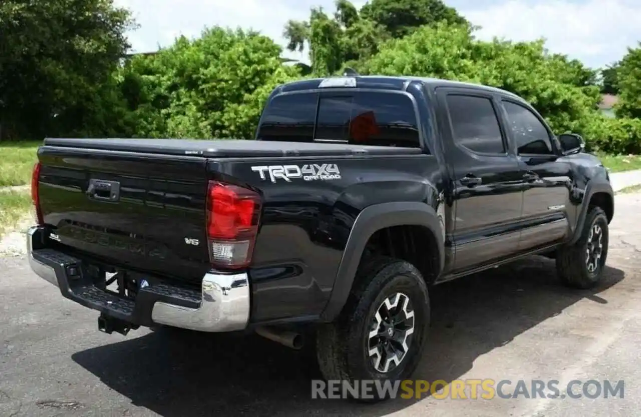 4 Photograph of a damaged car 3TMCZ5ANXKM275126 TOYOTA TACOMA 2019