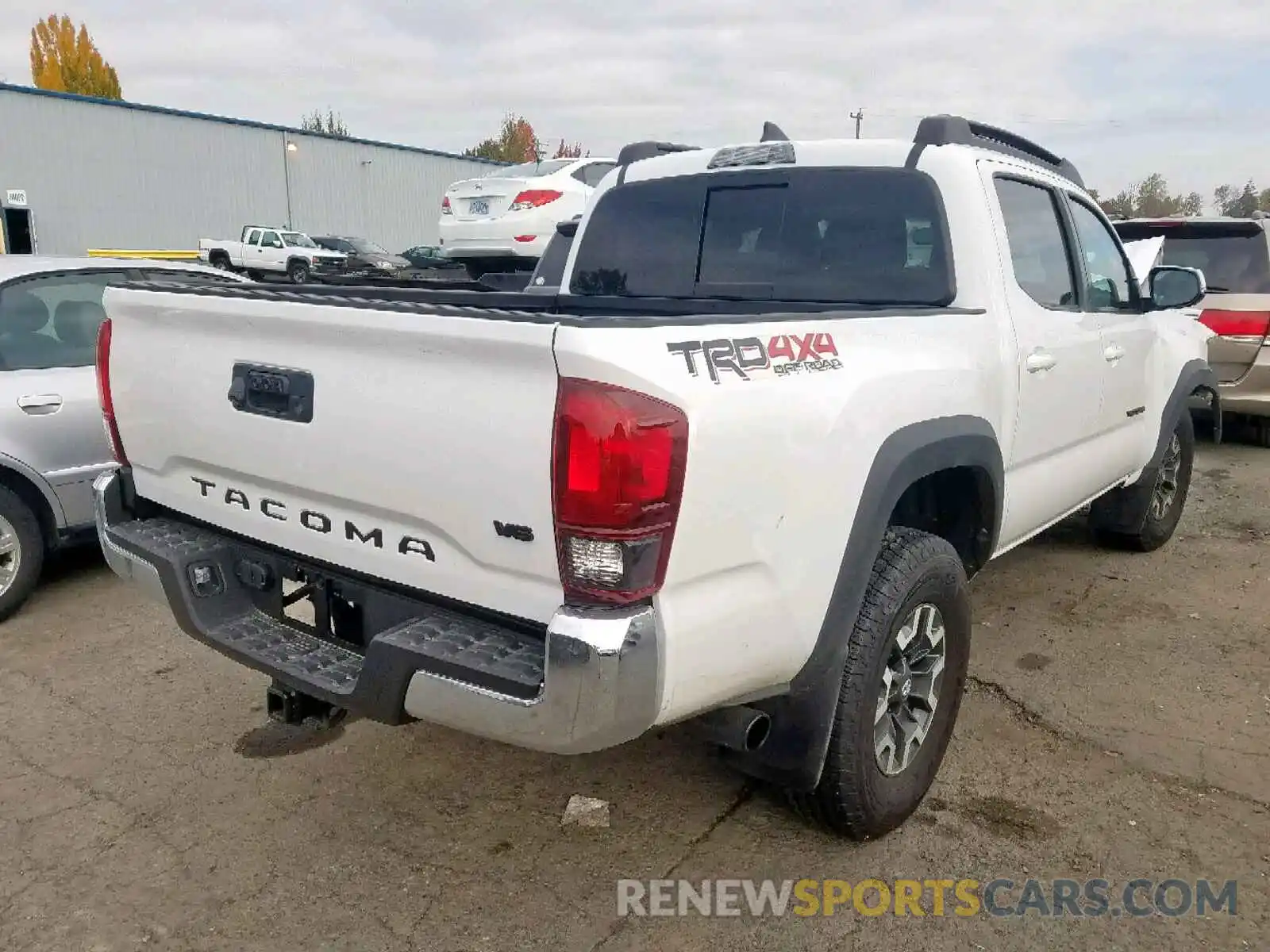 4 Photograph of a damaged car 3TMCZ5ANXKM275529 TOYOTA TACOMA 2019