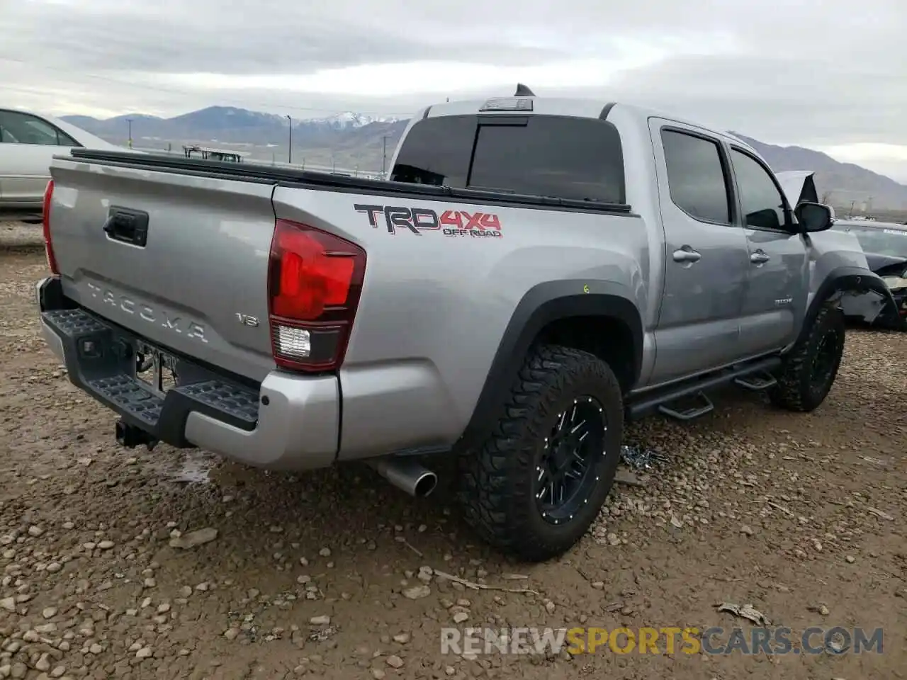 4 Photograph of a damaged car 3TMCZ5ANXKM275661 TOYOTA TACOMA 2019