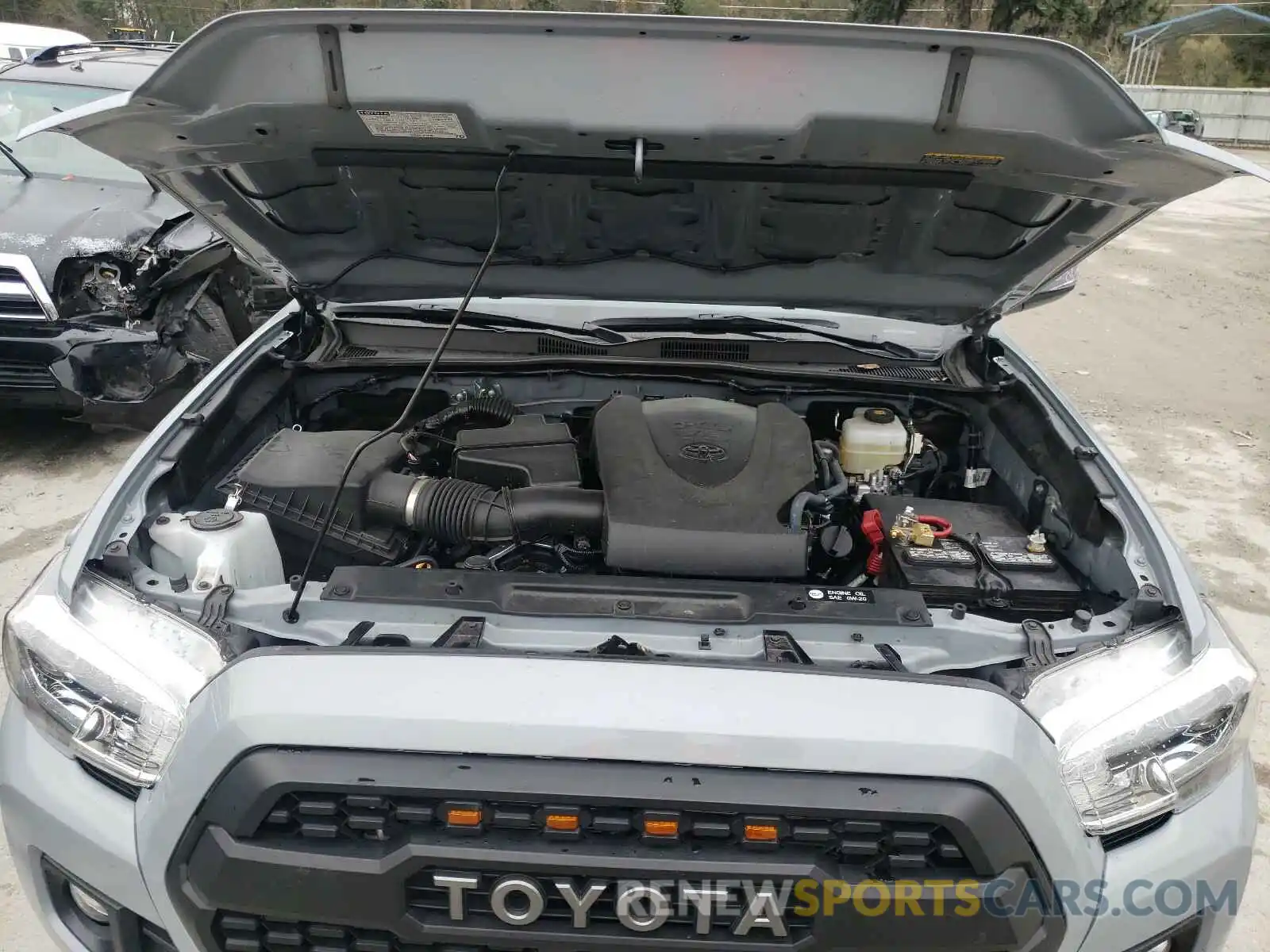 7 Photograph of a damaged car 3TMCZ5ANXKM275871 TOYOTA TACOMA 2019