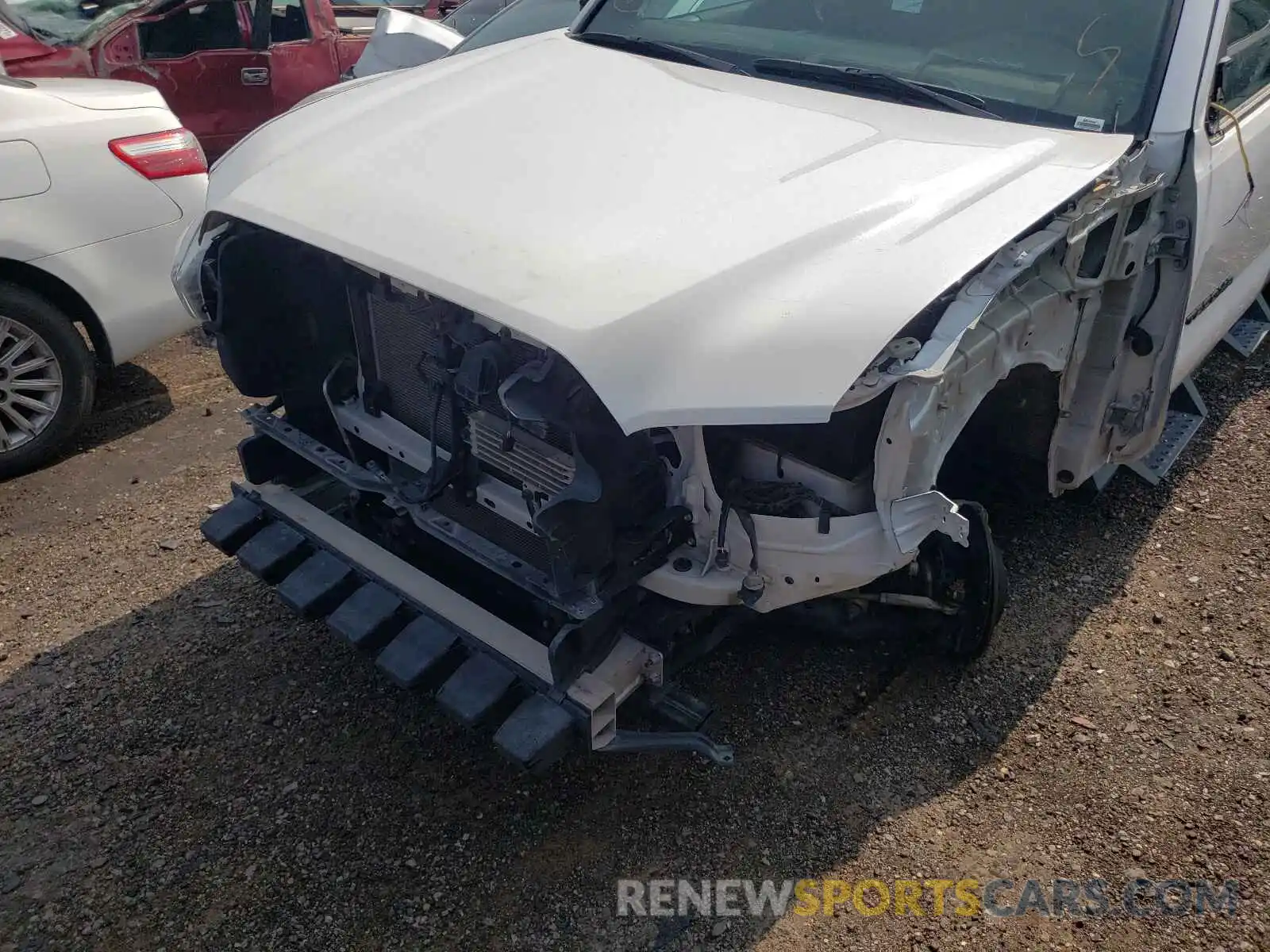 9 Photograph of a damaged car 3TMCZ5ANXKM277846 TOYOTA TACOMA 2019