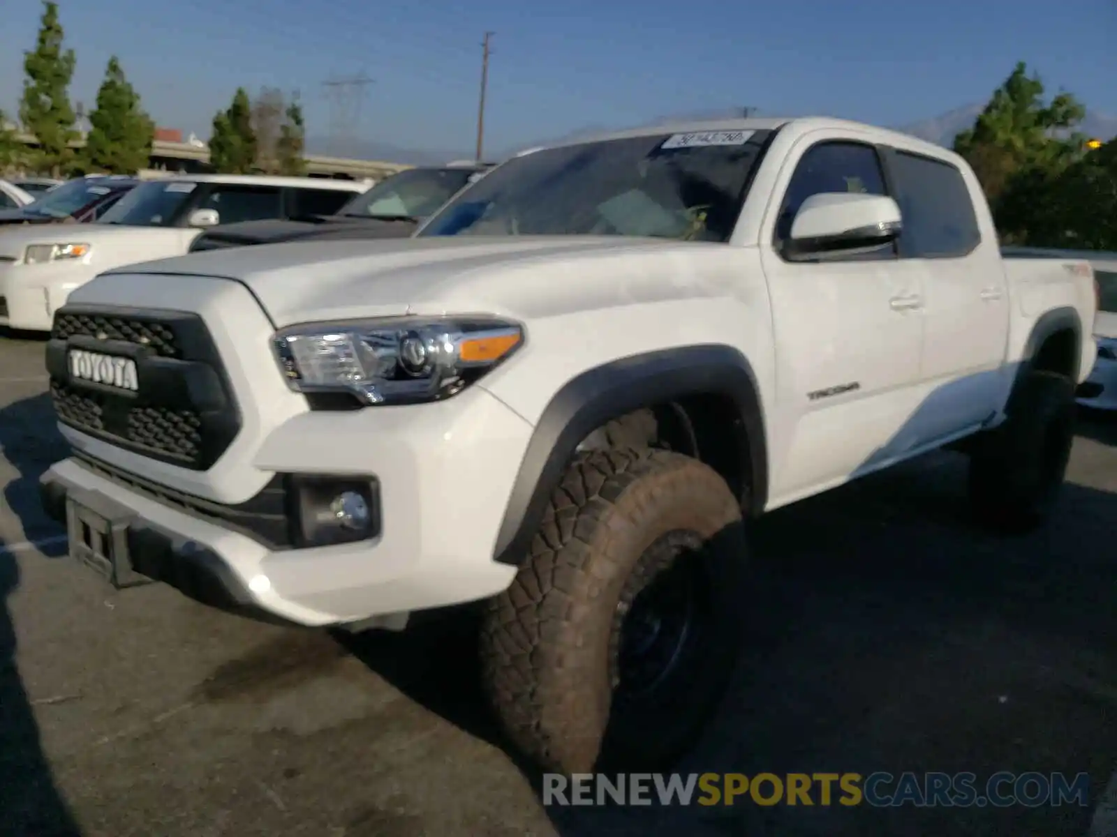 2 Photograph of a damaged car 3TMCZ5ANXKM278009 TOYOTA TACOMA 2019