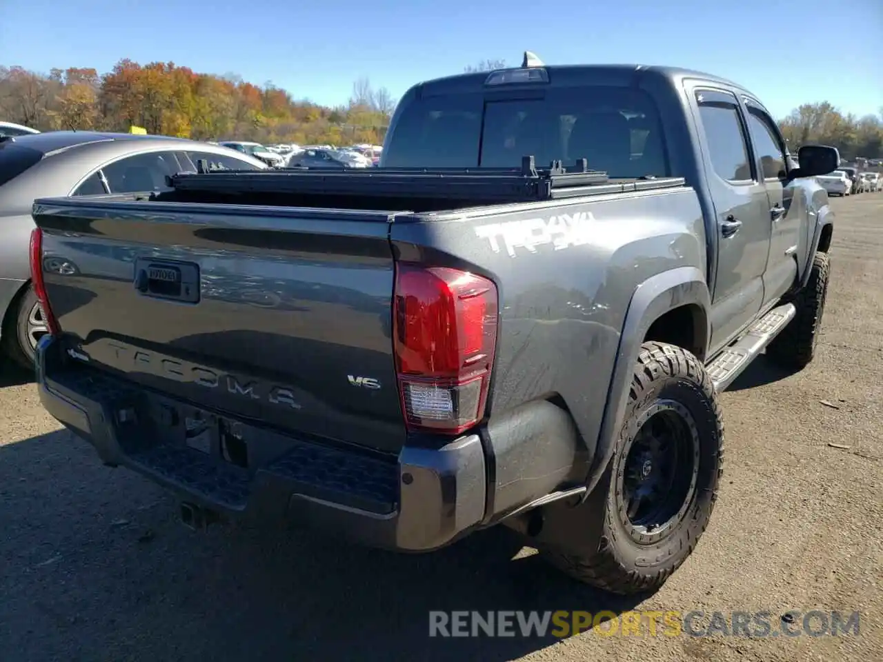 4 Photograph of a damaged car 3TMCZ5ANXKM282108 TOYOTA TACOMA 2019