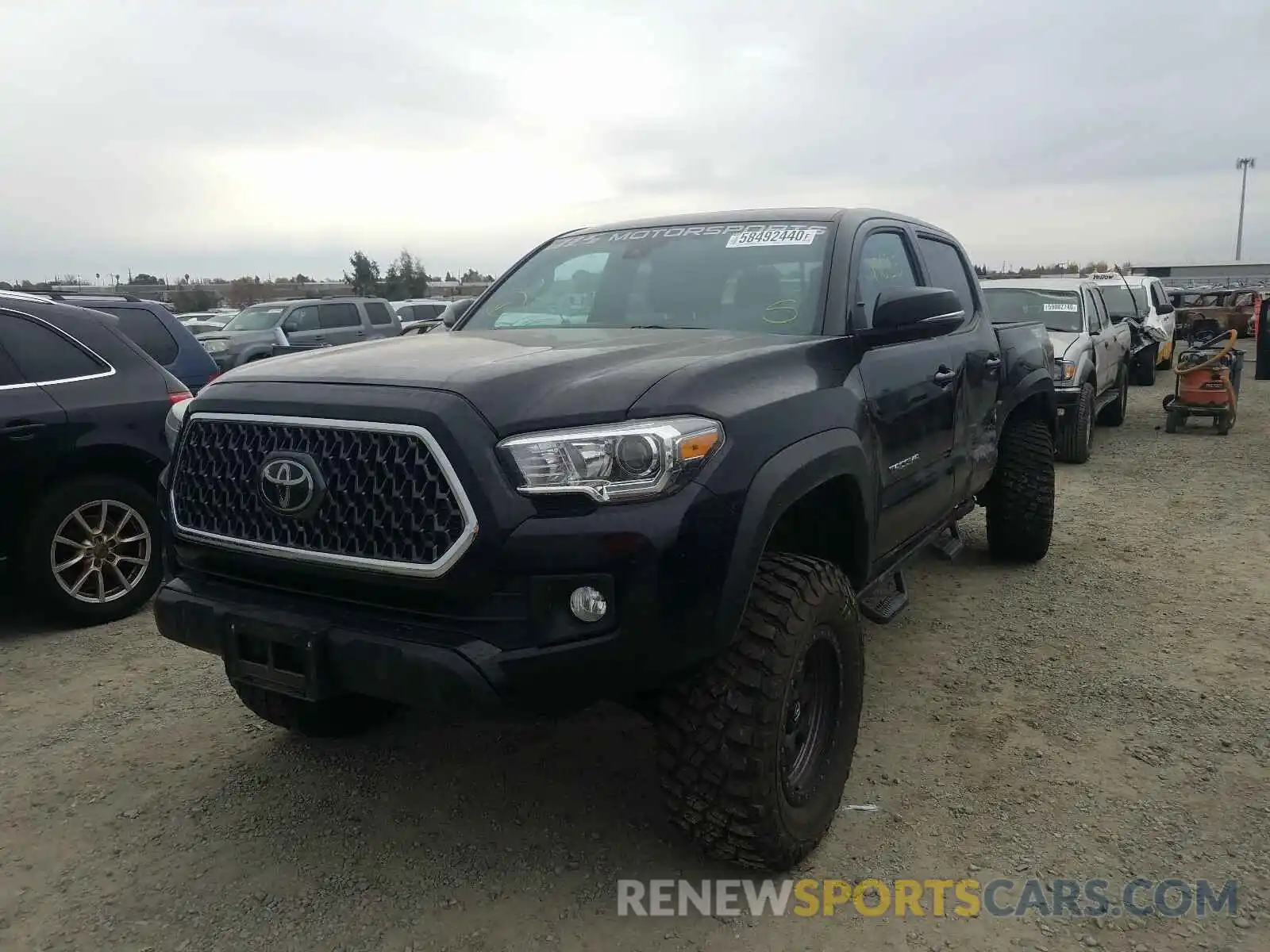 2 Photograph of a damaged car 3TMCZ5ANXKM282268 TOYOTA TACOMA 2019