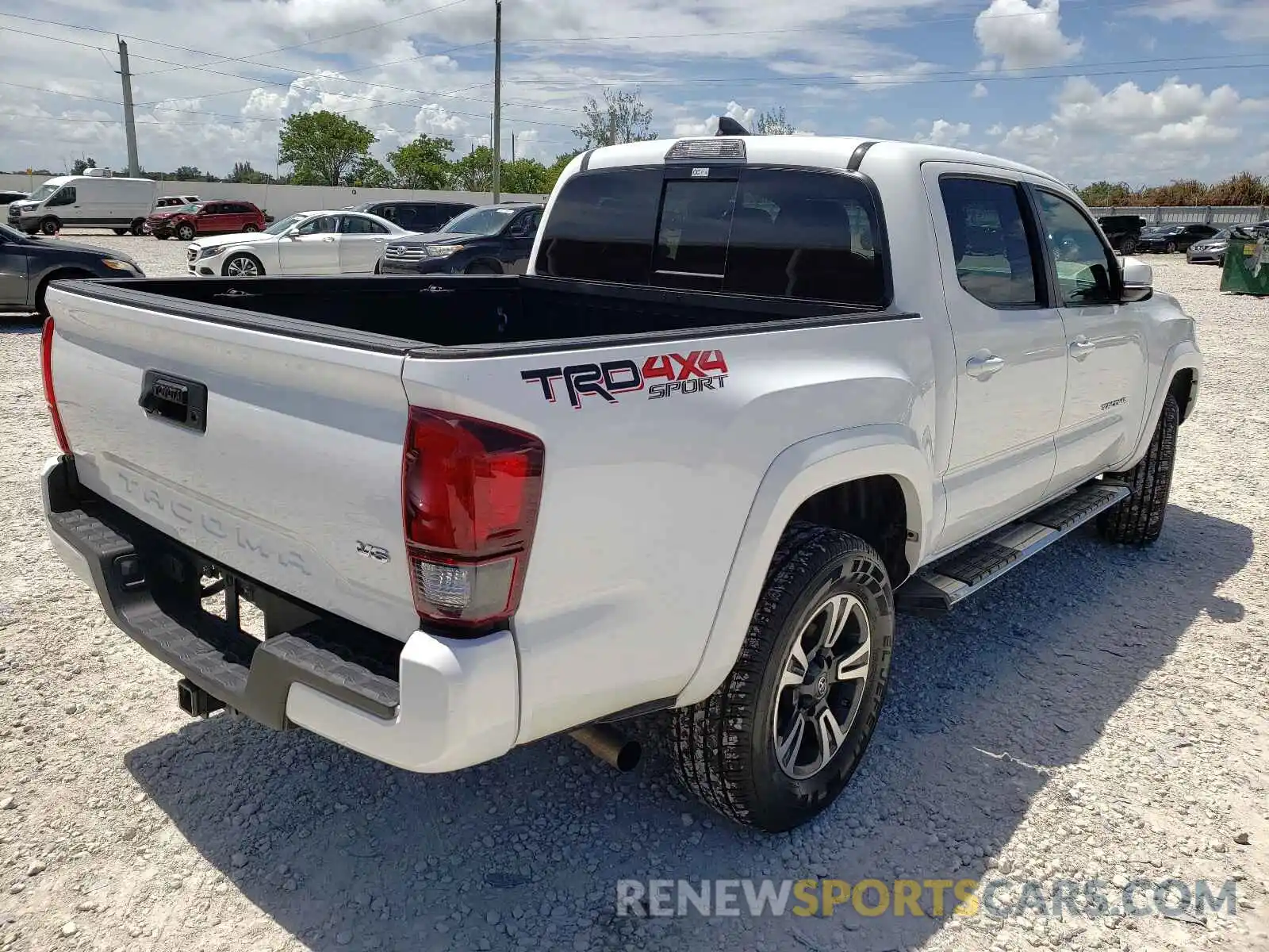 4 Photograph of a damaged car 3TMCZ5ANXKM284389 TOYOTA TACOMA 2019