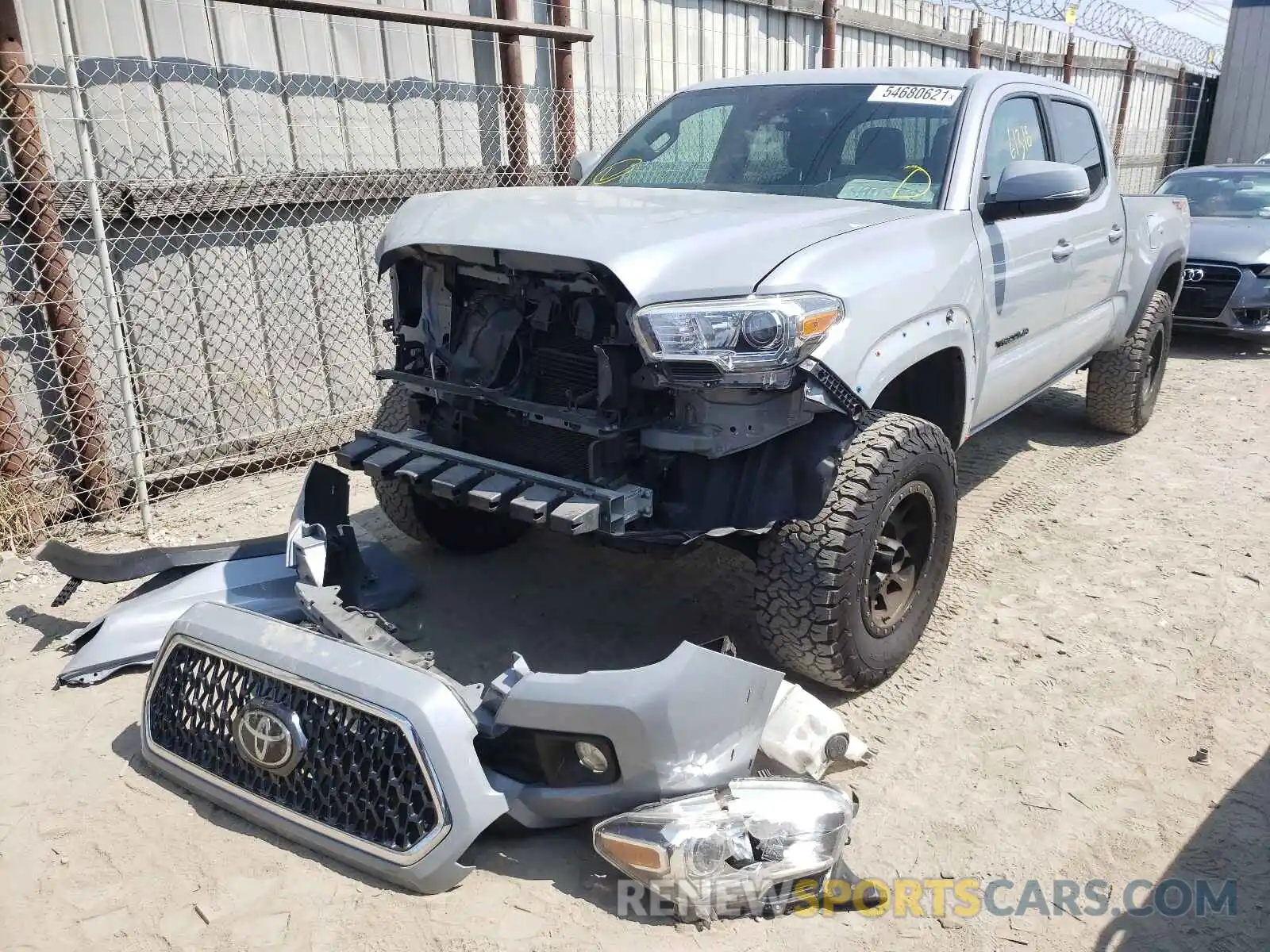 2 Photograph of a damaged car 3TMDZ5BN0KM057859 TOYOTA TACOMA 2019