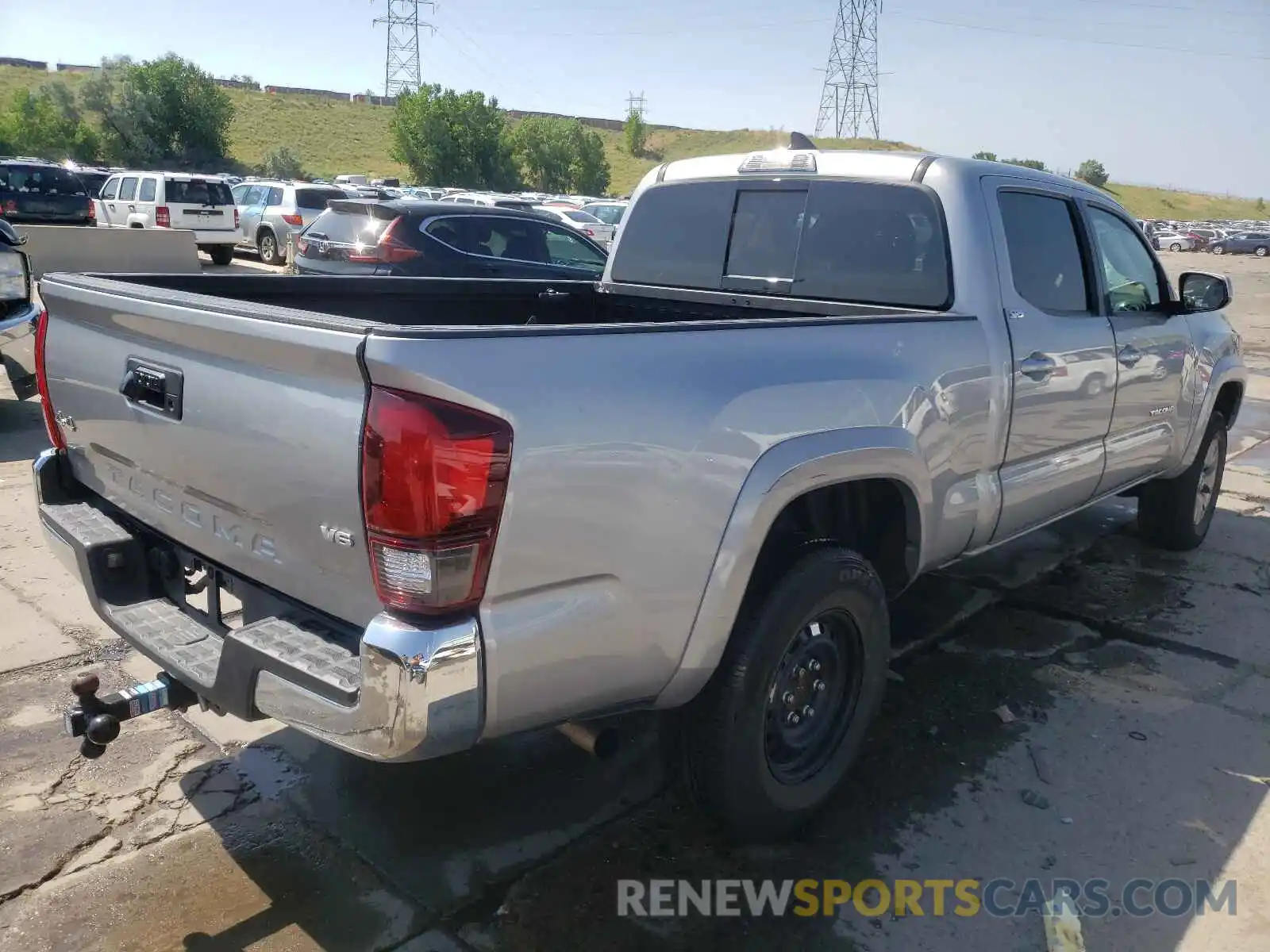 4 Photograph of a damaged car 3TMDZ5BN0KM060597 TOYOTA TACOMA 2019