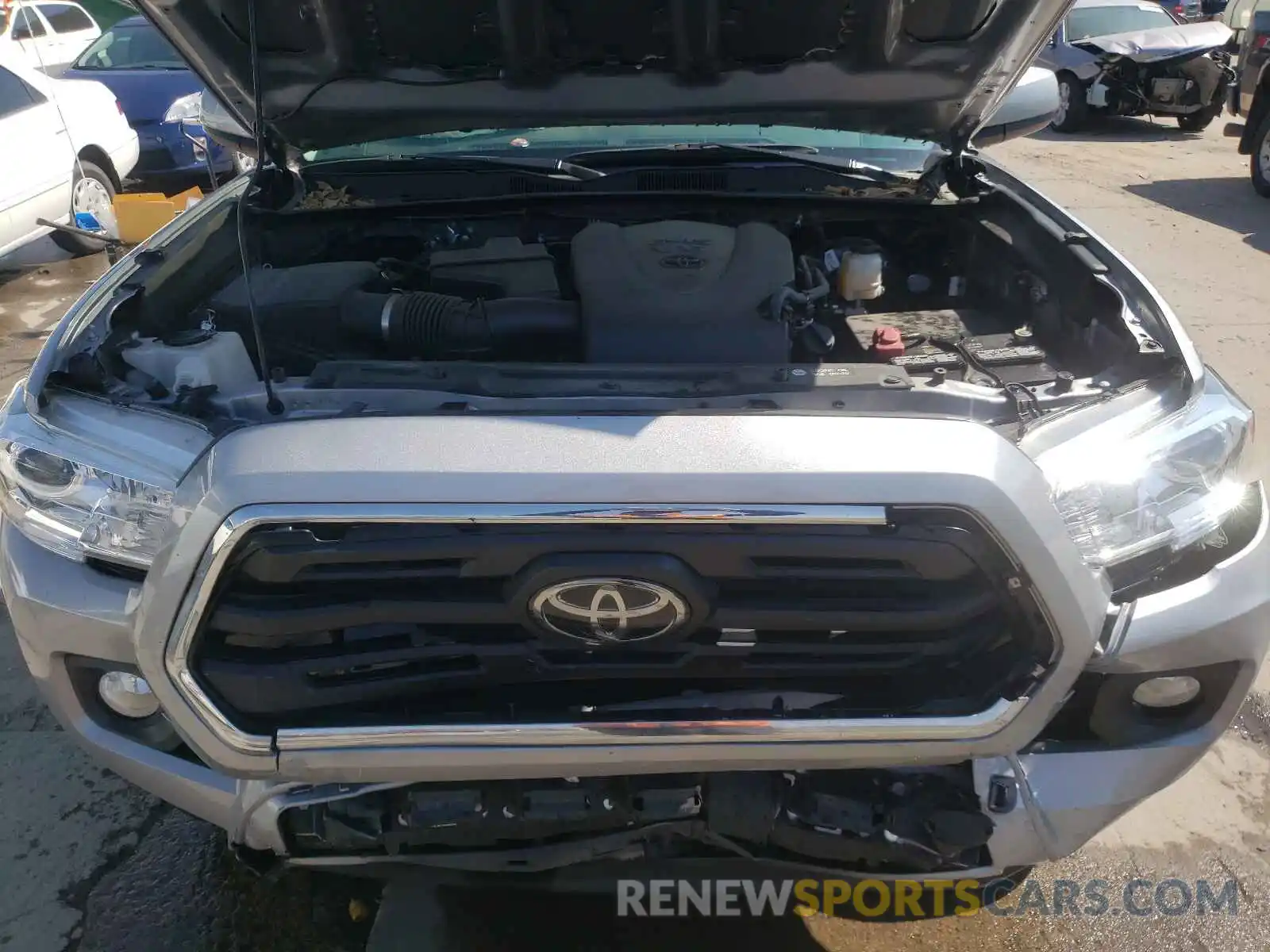 7 Photograph of a damaged car 3TMDZ5BN0KM060597 TOYOTA TACOMA 2019