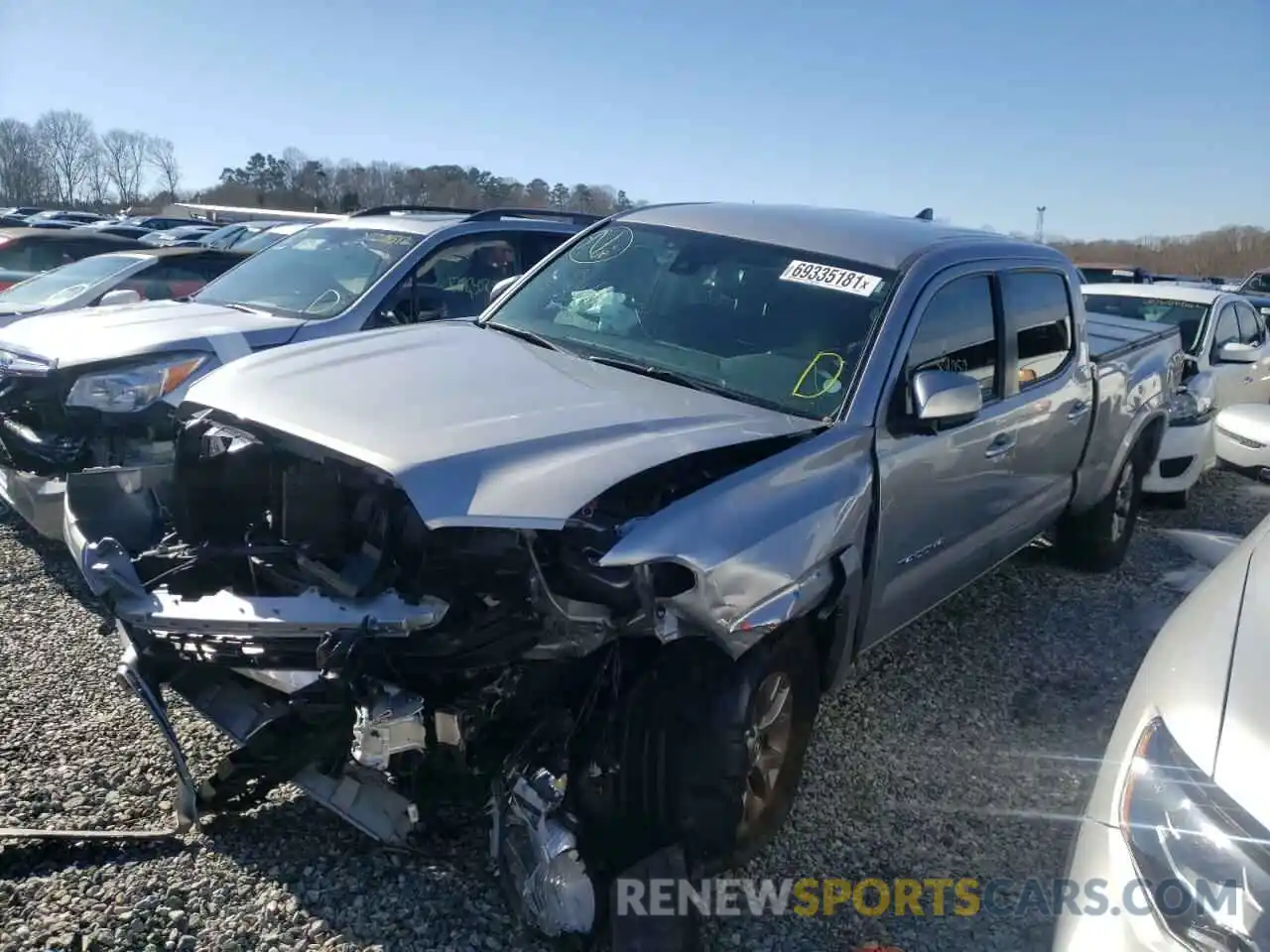 2 Photograph of a damaged car 3TMDZ5BN0KM061233 TOYOTA TACOMA 2019