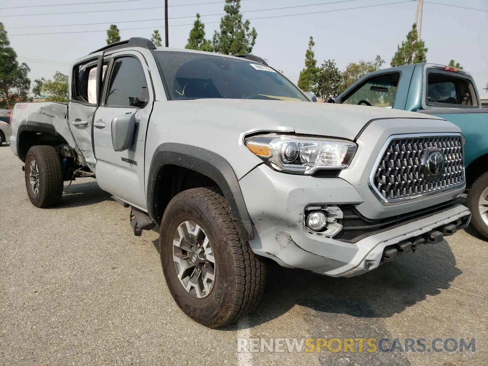 1 Photograph of a damaged car 3TMDZ5BN0KM062561 TOYOTA TACOMA 2019