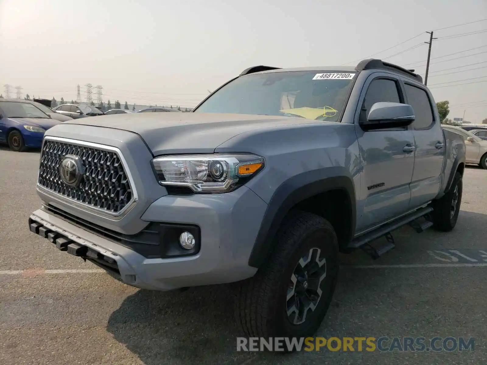 2 Photograph of a damaged car 3TMDZ5BN0KM062561 TOYOTA TACOMA 2019