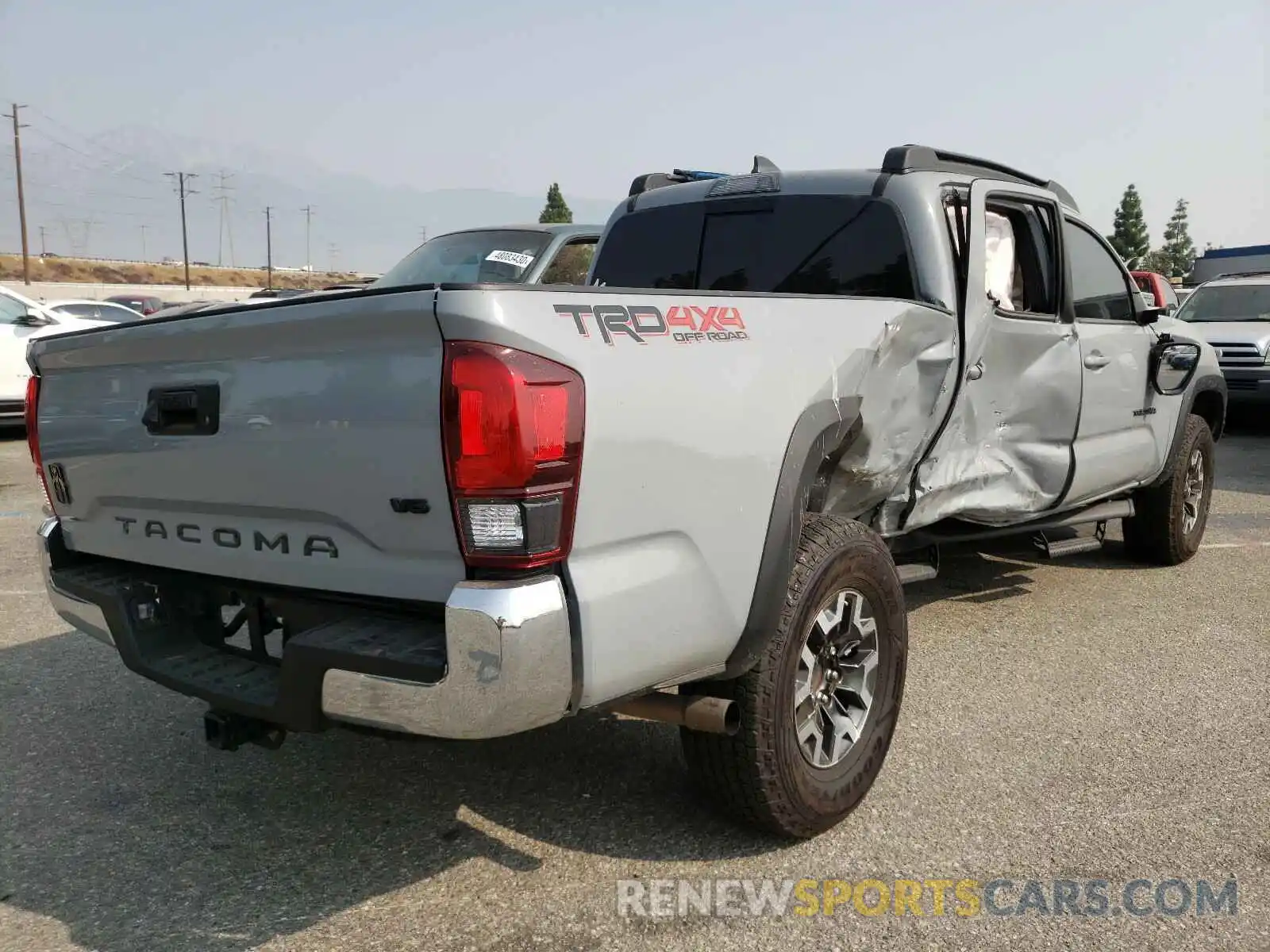 4 Photograph of a damaged car 3TMDZ5BN0KM062561 TOYOTA TACOMA 2019