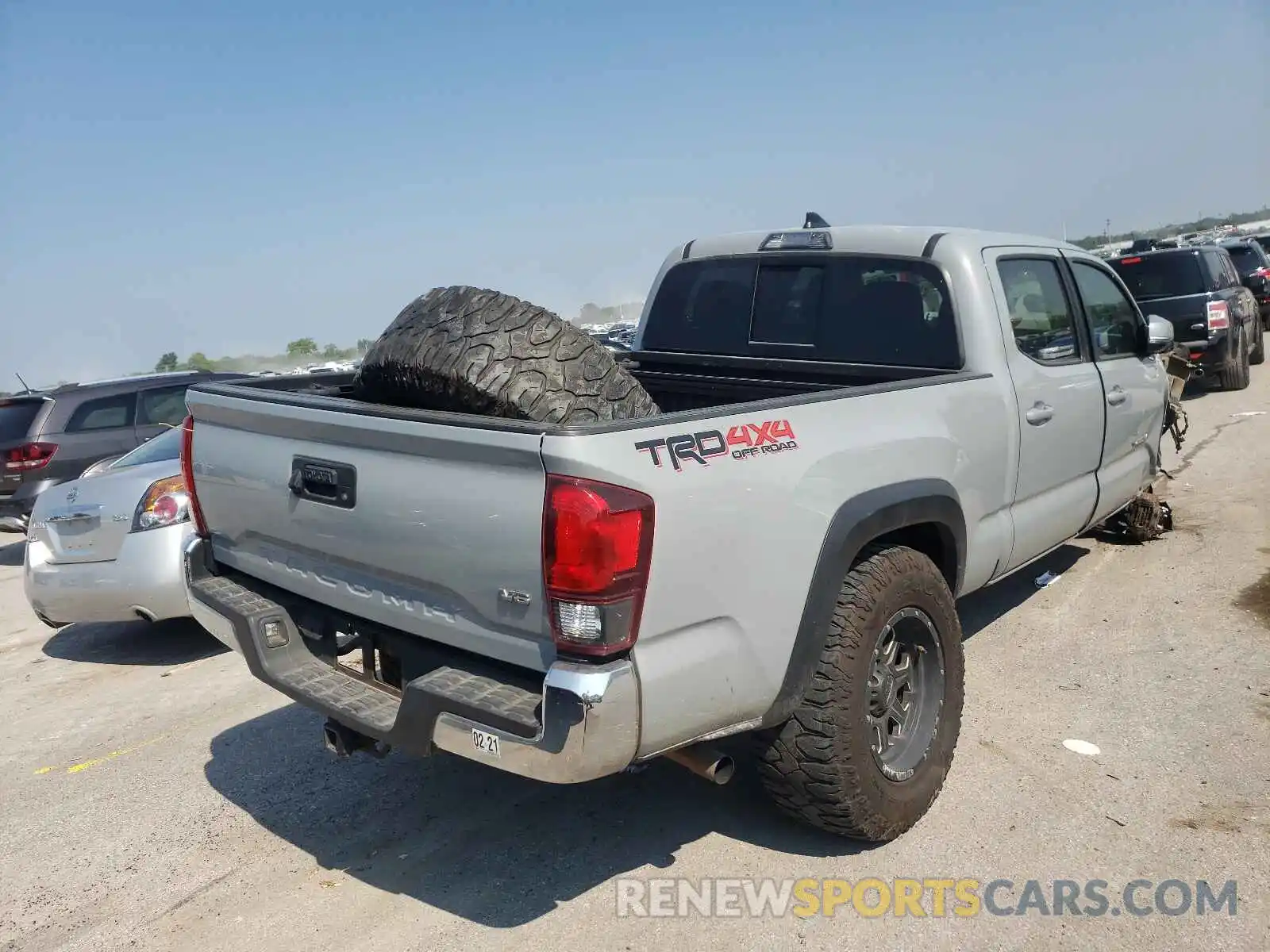 4 Photograph of a damaged car 3TMDZ5BN0KM063242 TOYOTA TACOMA 2019