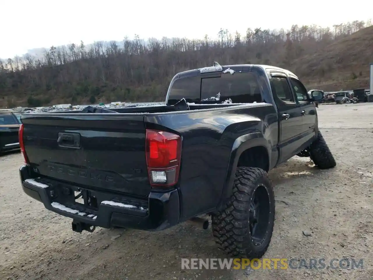 4 Photograph of a damaged car 3TMDZ5BN0KM066352 TOYOTA TACOMA 2019