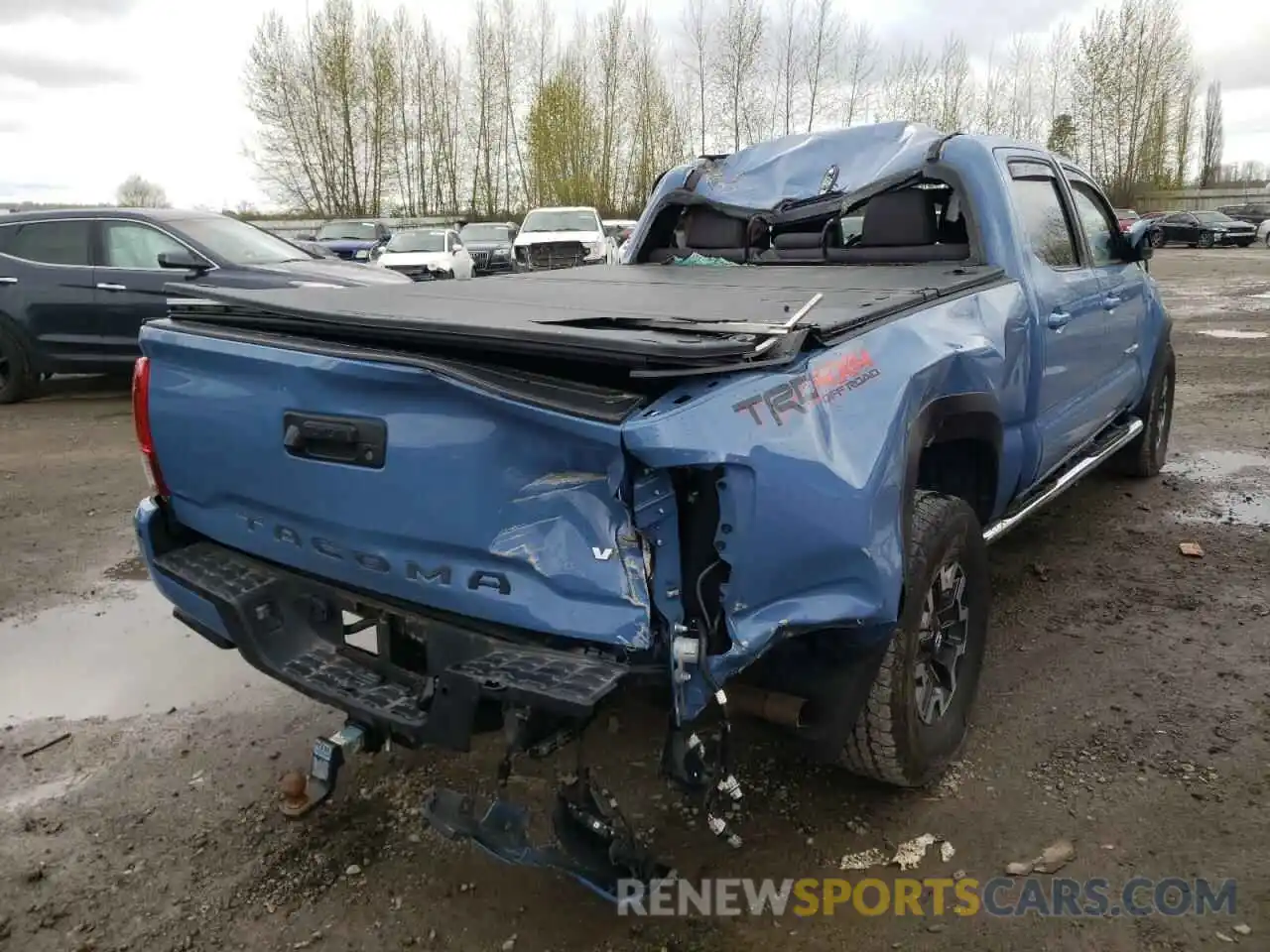 4 Photograph of a damaged car 3TMDZ5BN0KM066898 TOYOTA TACOMA 2019