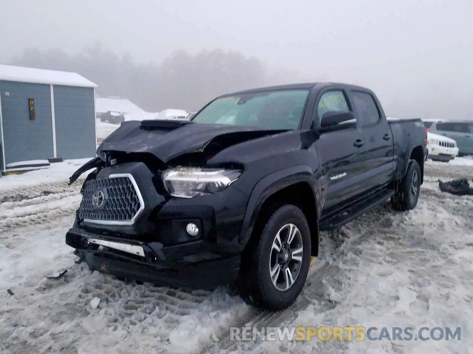 2 Photograph of a damaged car 3TMDZ5BN0KM068957 TOYOTA TACOMA 2019