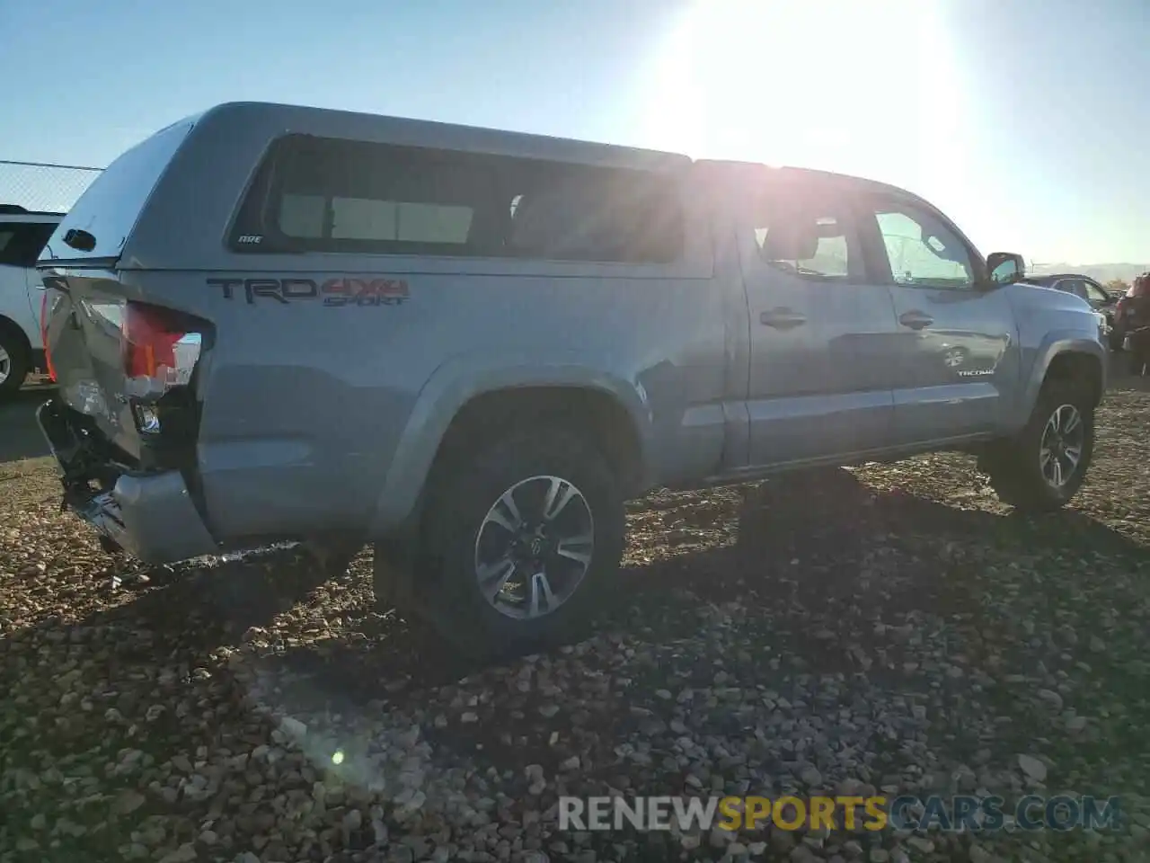 4 Photograph of a damaged car 3TMDZ5BN0KM069736 TOYOTA TACOMA 2019