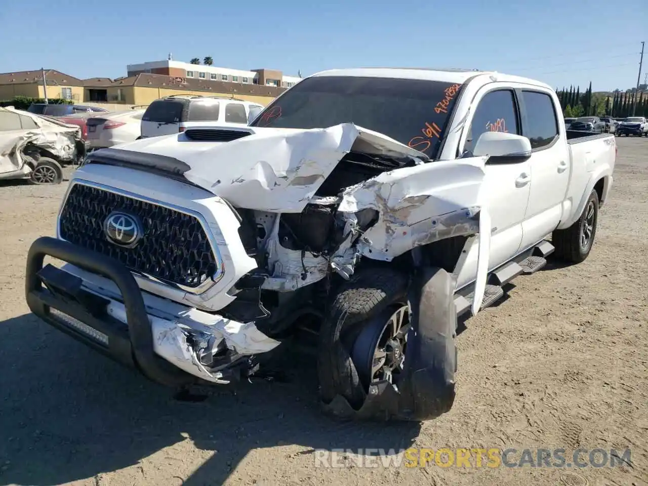 2 Photograph of a damaged car 3TMDZ5BN0KM071700 TOYOTA TACOMA 2019