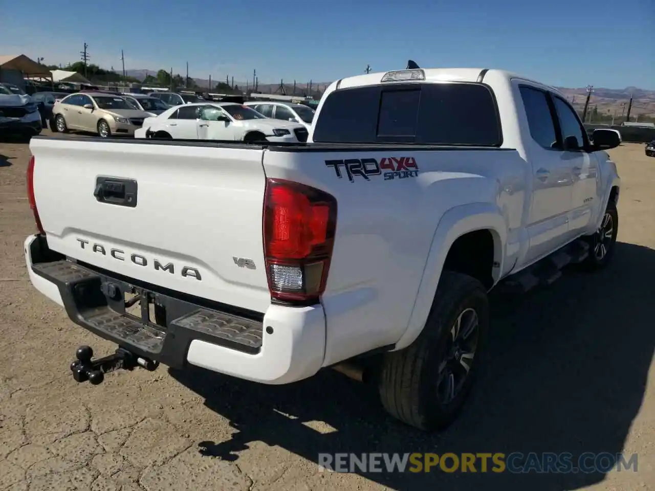 4 Photograph of a damaged car 3TMDZ5BN0KM071700 TOYOTA TACOMA 2019