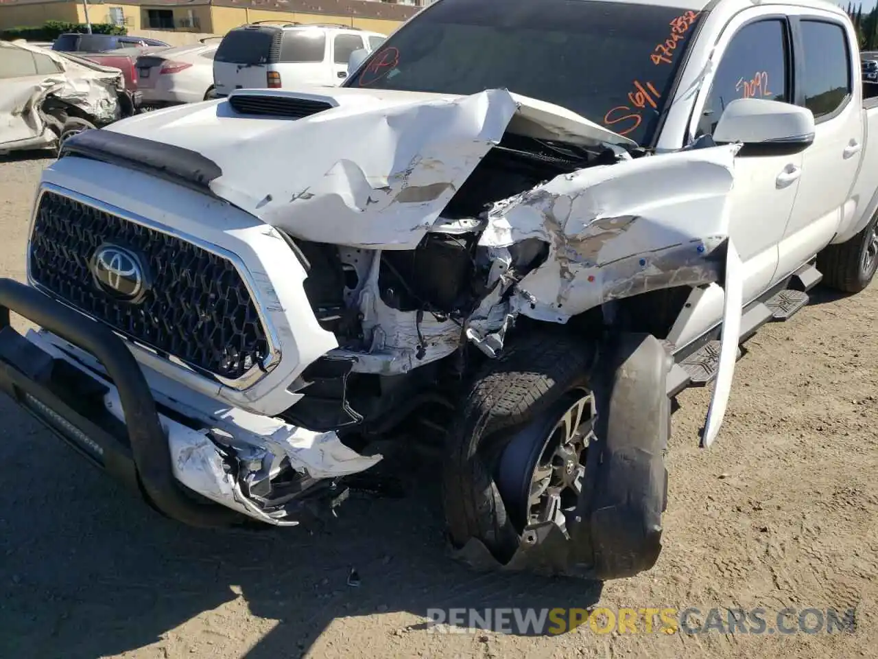 9 Photograph of a damaged car 3TMDZ5BN0KM071700 TOYOTA TACOMA 2019