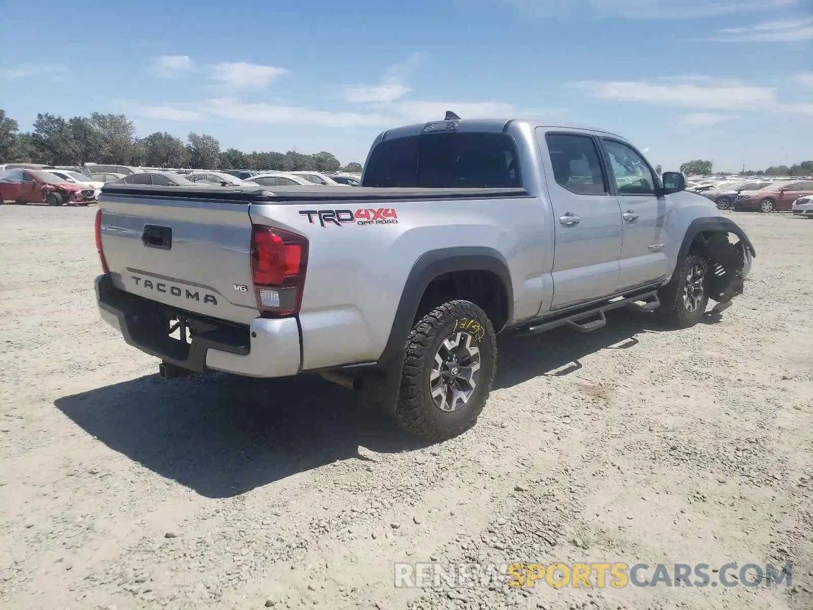 4 Photograph of a damaged car 3TMDZ5BN1KM055893 TOYOTA TACOMA 2019