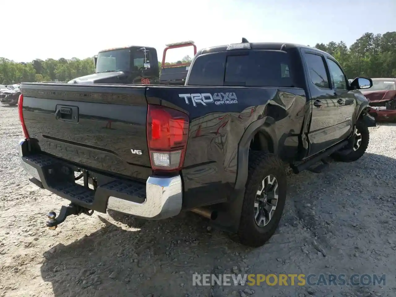 4 Photograph of a damaged car 3TMDZ5BN1KM057563 TOYOTA TACOMA 2019