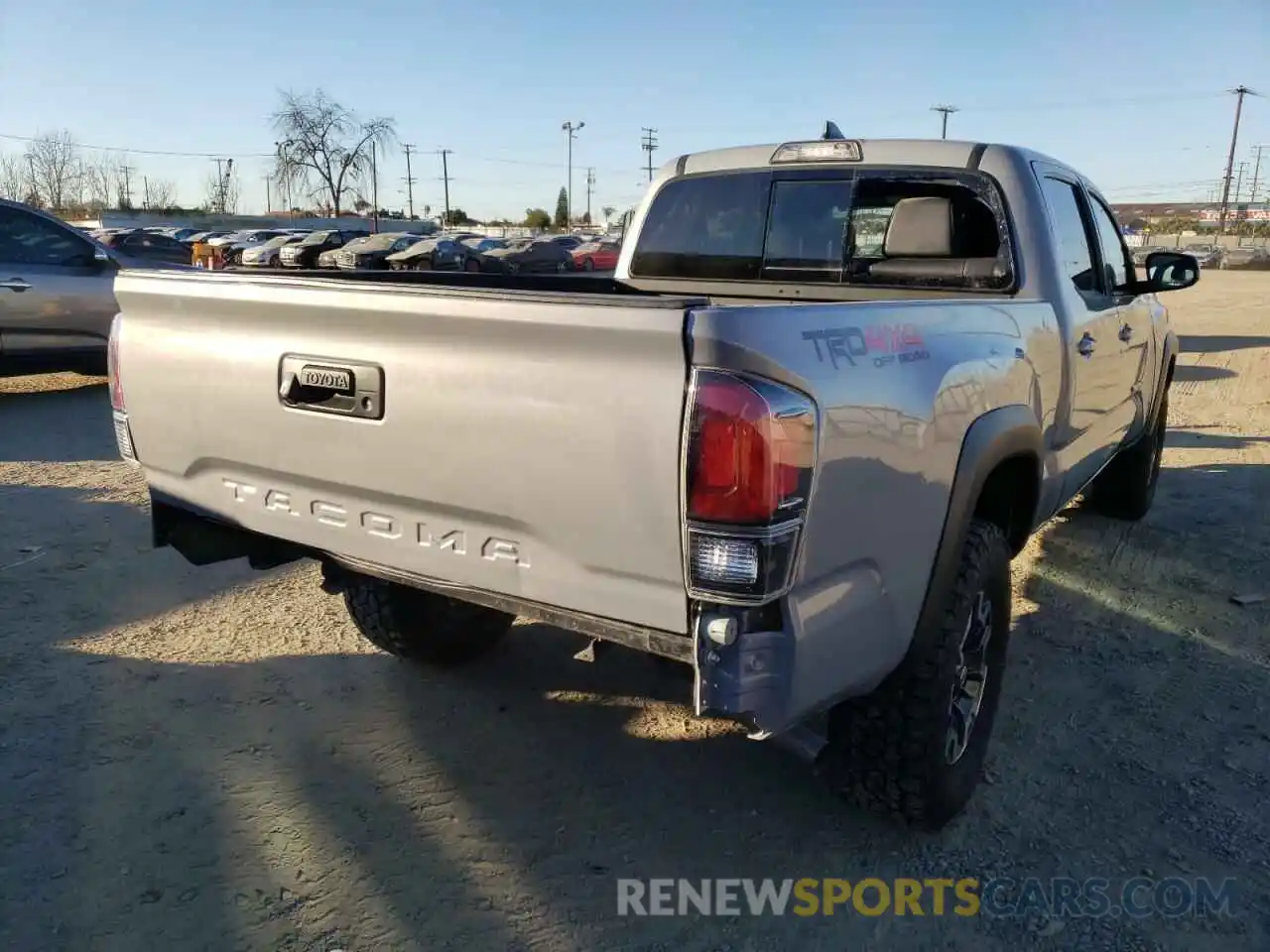 4 Photograph of a damaged car 3TMDZ5BN1KM060687 TOYOTA TACOMA 2019