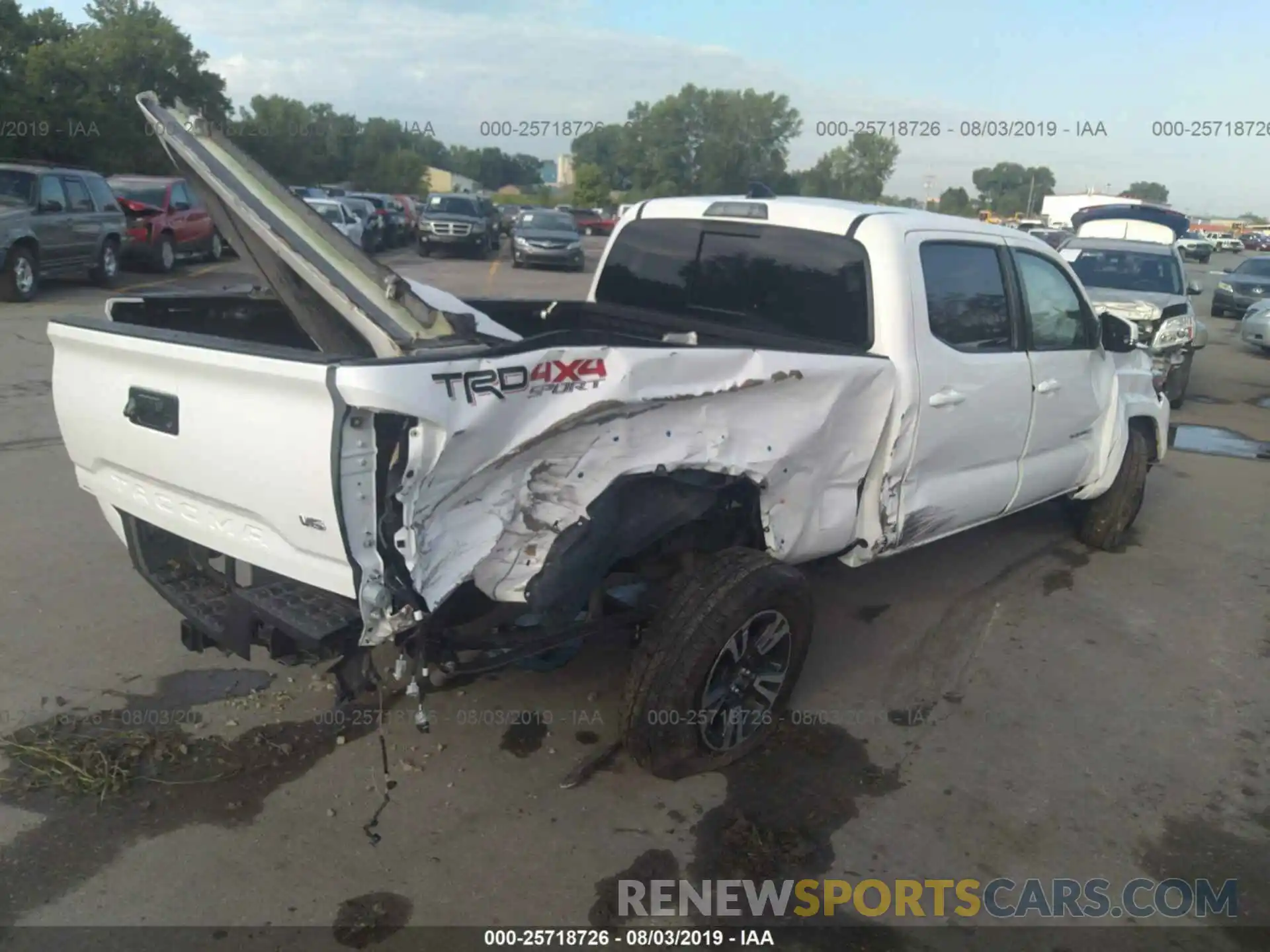 4 Photograph of a damaged car 3TMDZ5BN1KM061922 TOYOTA TACOMA 2019