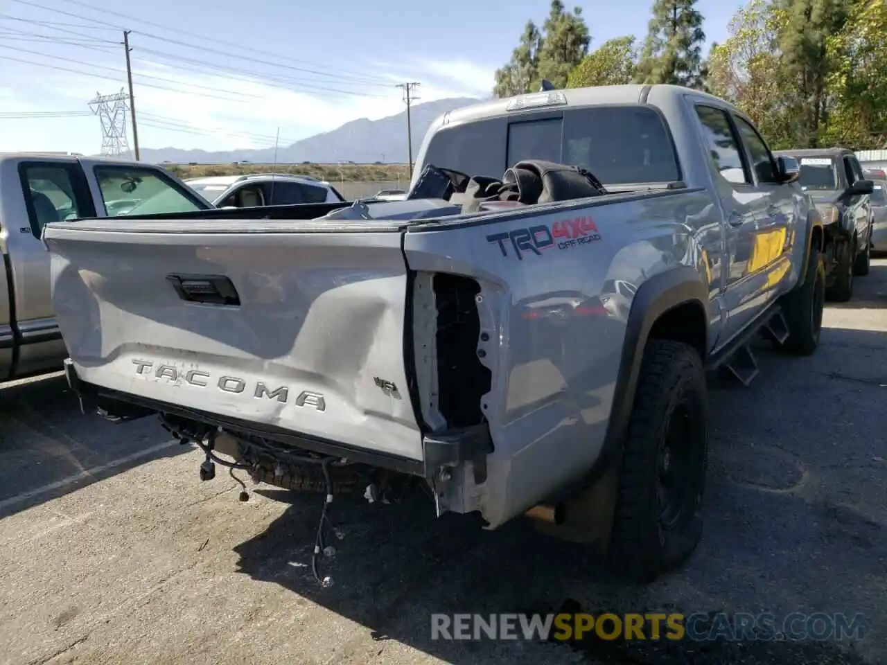 4 Photograph of a damaged car 3TMDZ5BN1KM070815 TOYOTA TACOMA 2019