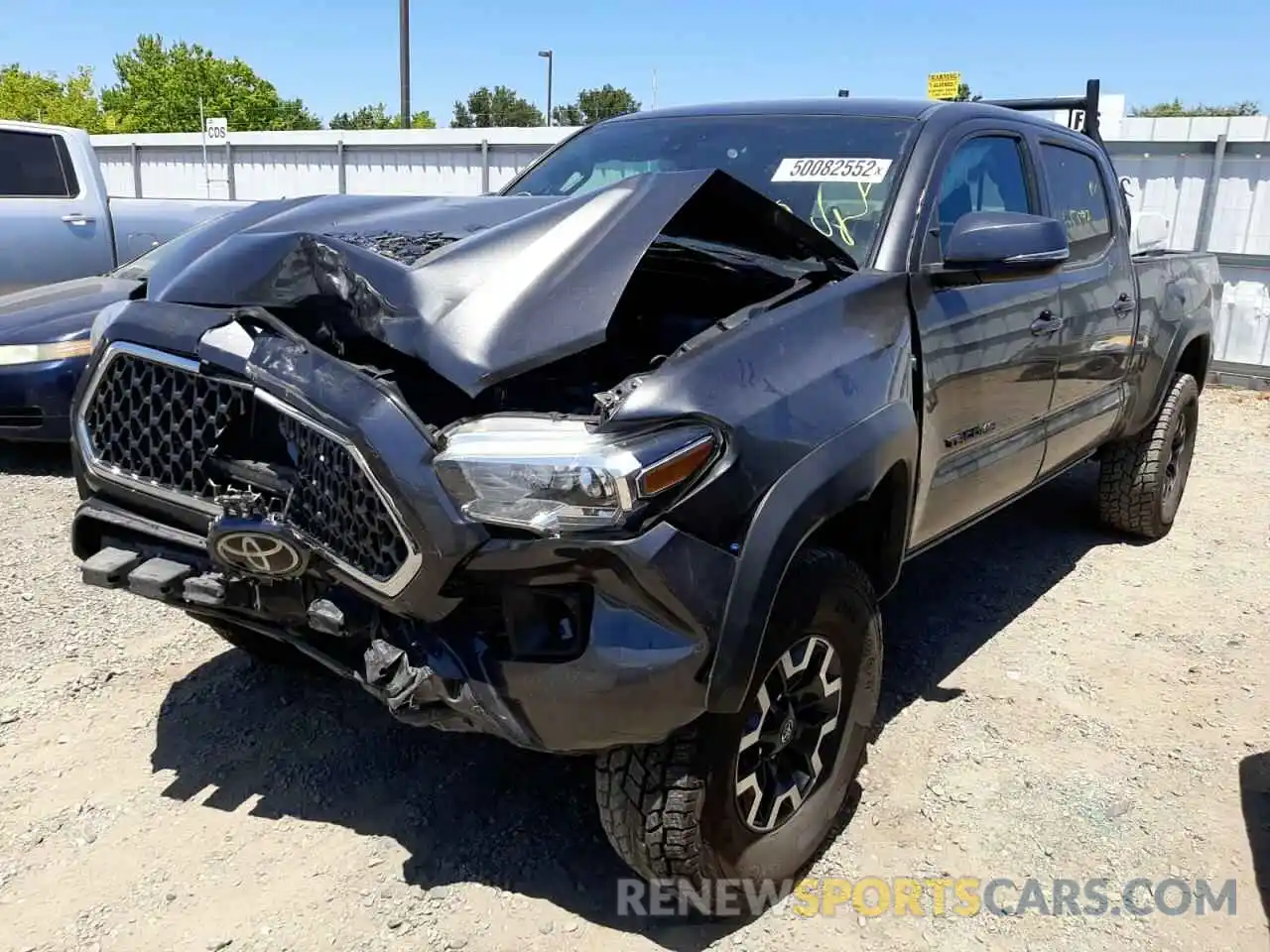 2 Photograph of a damaged car 3TMDZ5BN1KM070958 TOYOTA TACOMA 2019