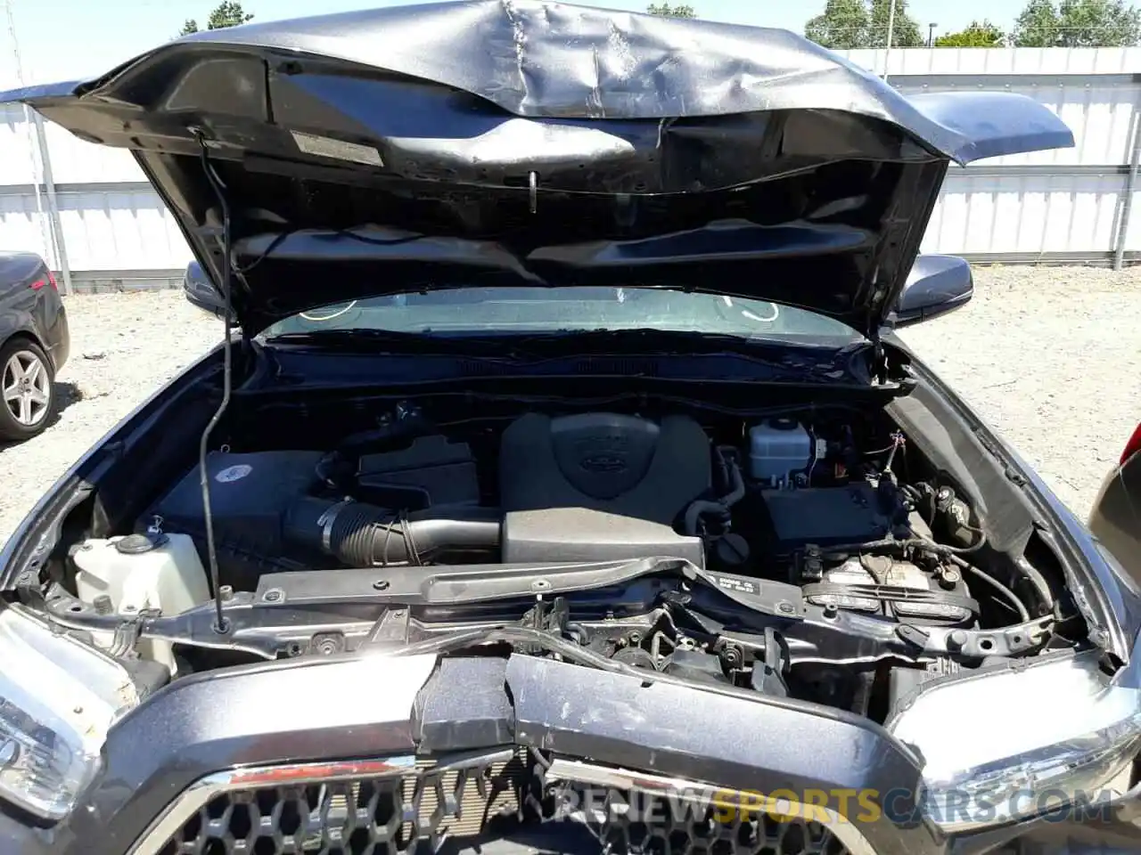 7 Photograph of a damaged car 3TMDZ5BN1KM070958 TOYOTA TACOMA 2019