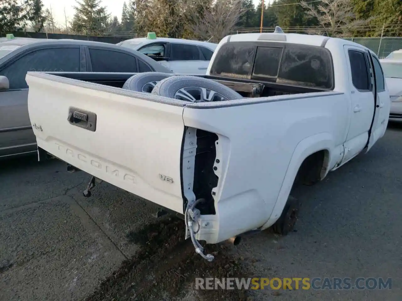 4 Photograph of a damaged car 3TMDZ5BN1KM077330 TOYOTA TACOMA 2019