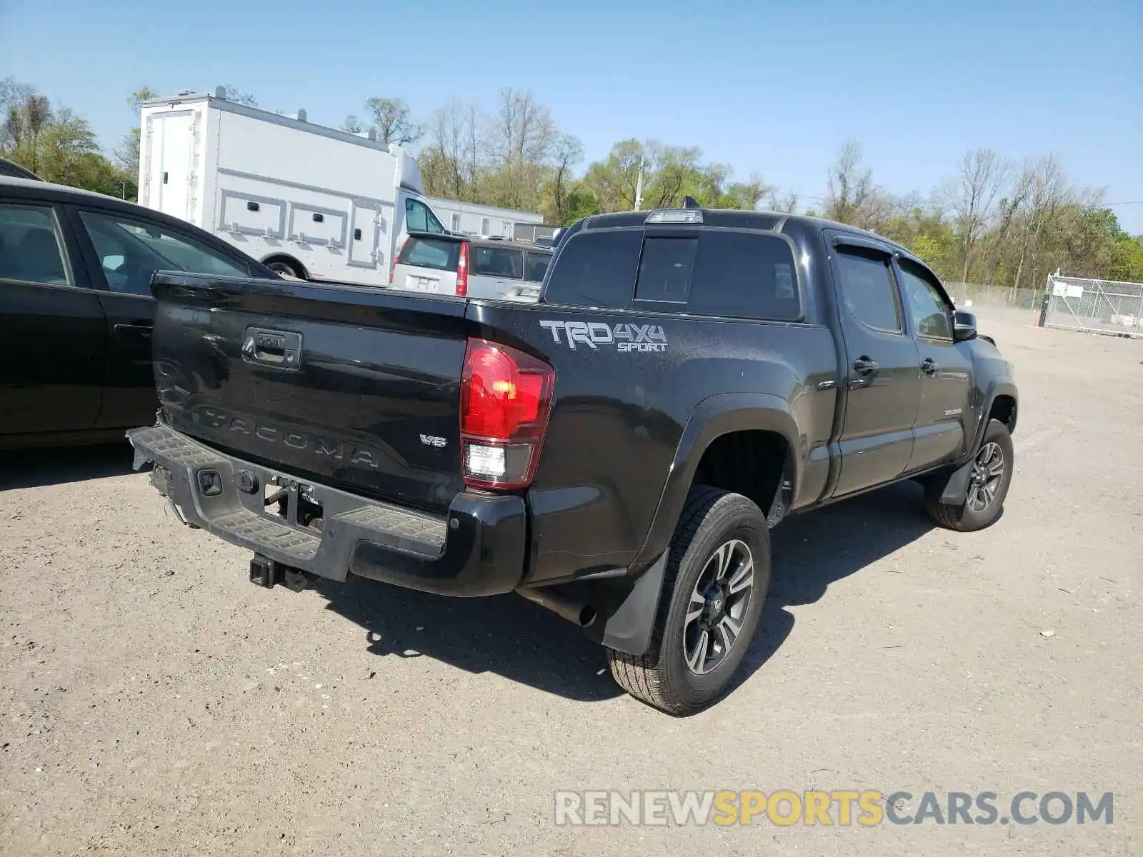 4 Photograph of a damaged car 3TMDZ5BN1KM079255 TOYOTA TACOMA 2019