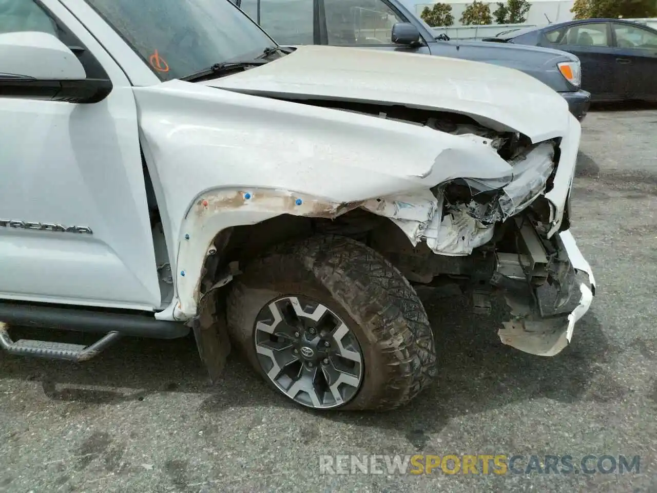 9 Photograph of a damaged car 3TMDZ5BN2KM058527 TOYOTA TACOMA 2019