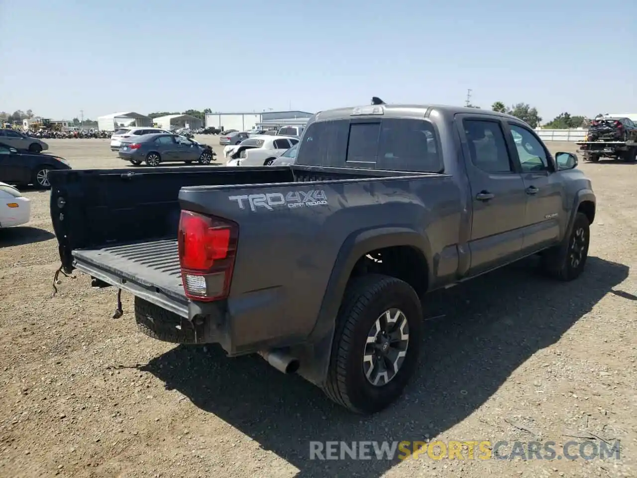 4 Photograph of a damaged car 3TMDZ5BN2KM061296 TOYOTA TACOMA 2019