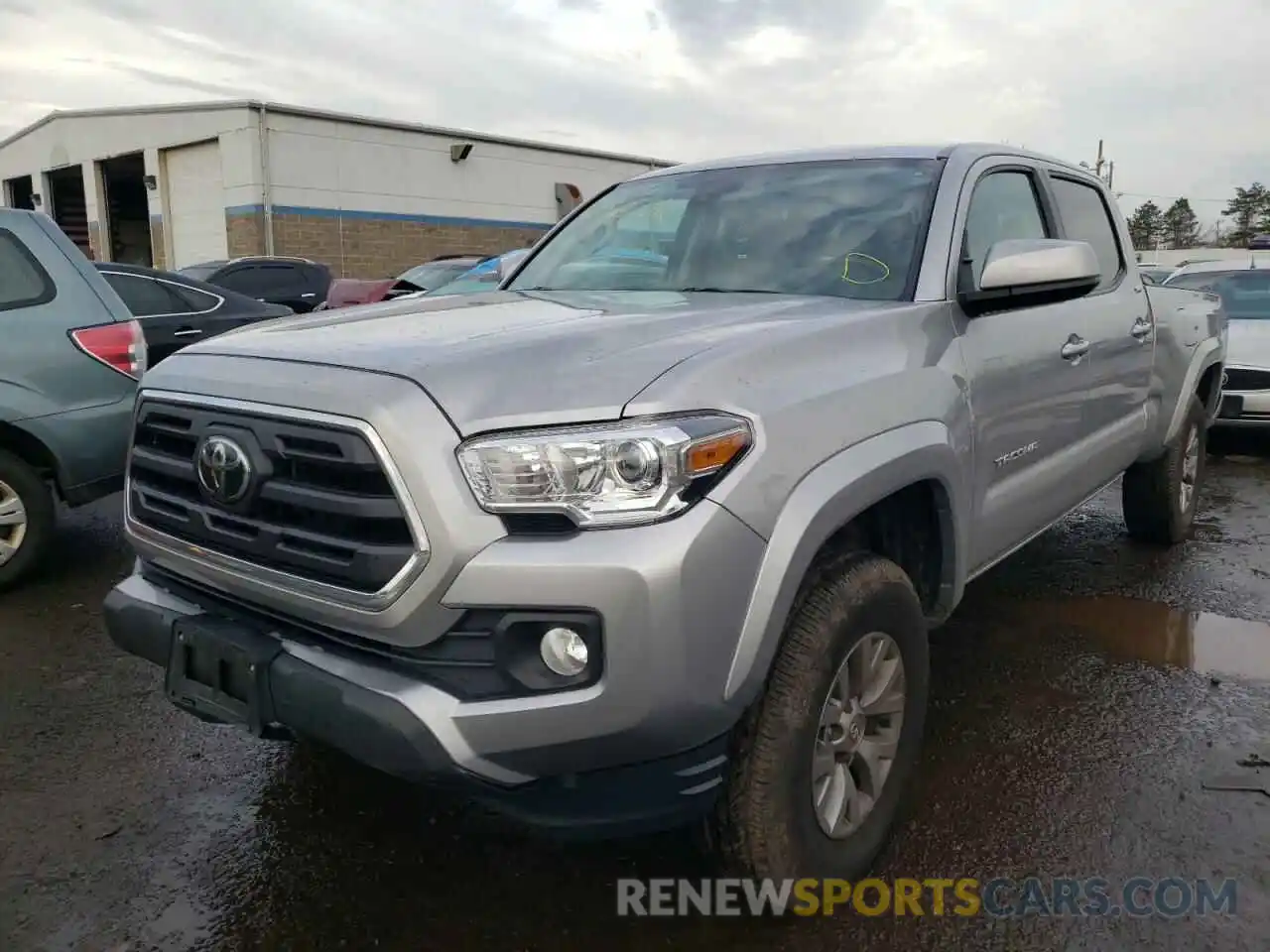 2 Photograph of a damaged car 3TMDZ5BN2KM063582 TOYOTA TACOMA 2019