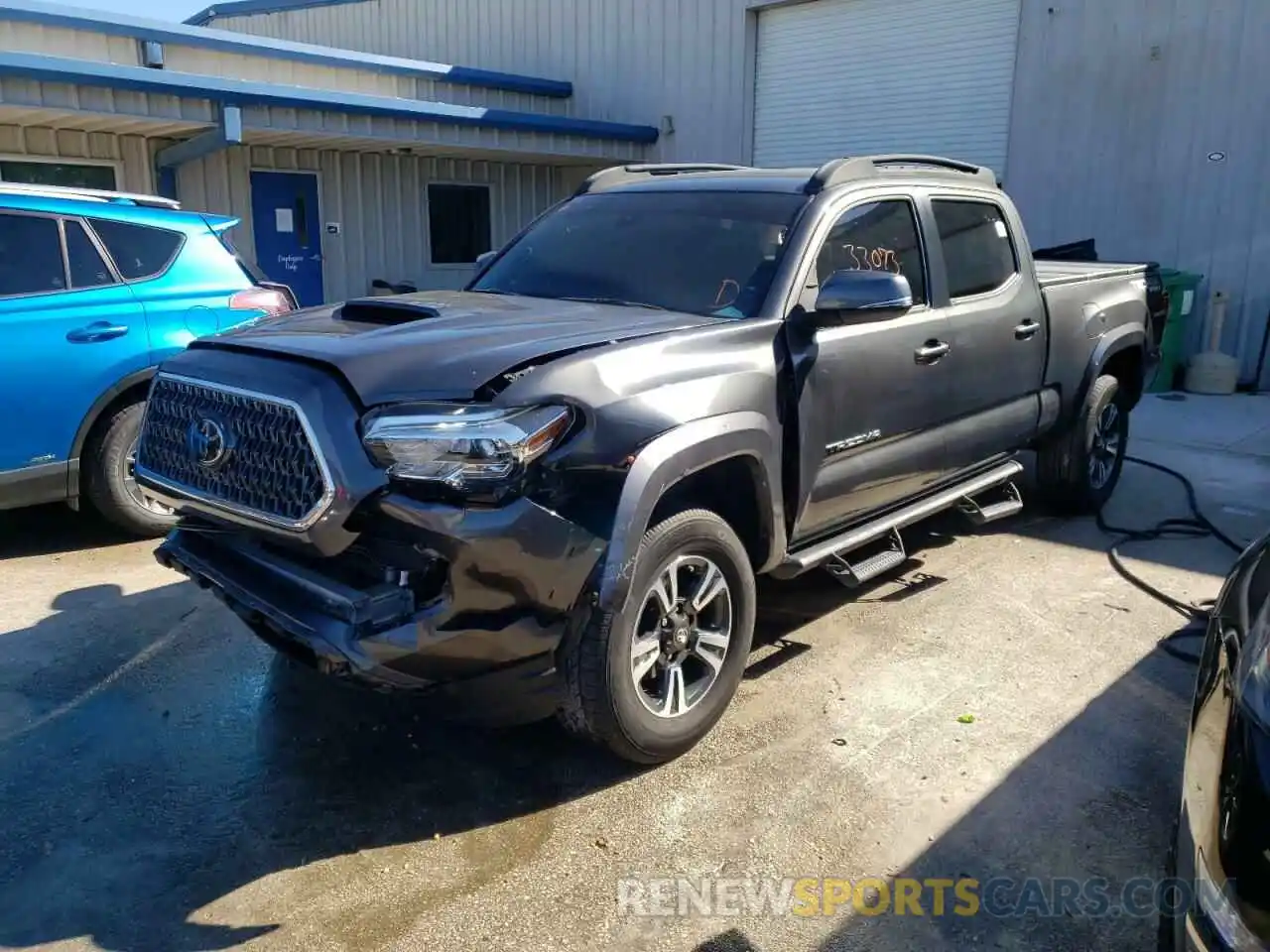 2 Photograph of a damaged car 3TMDZ5BN2KM070578 TOYOTA TACOMA 2019