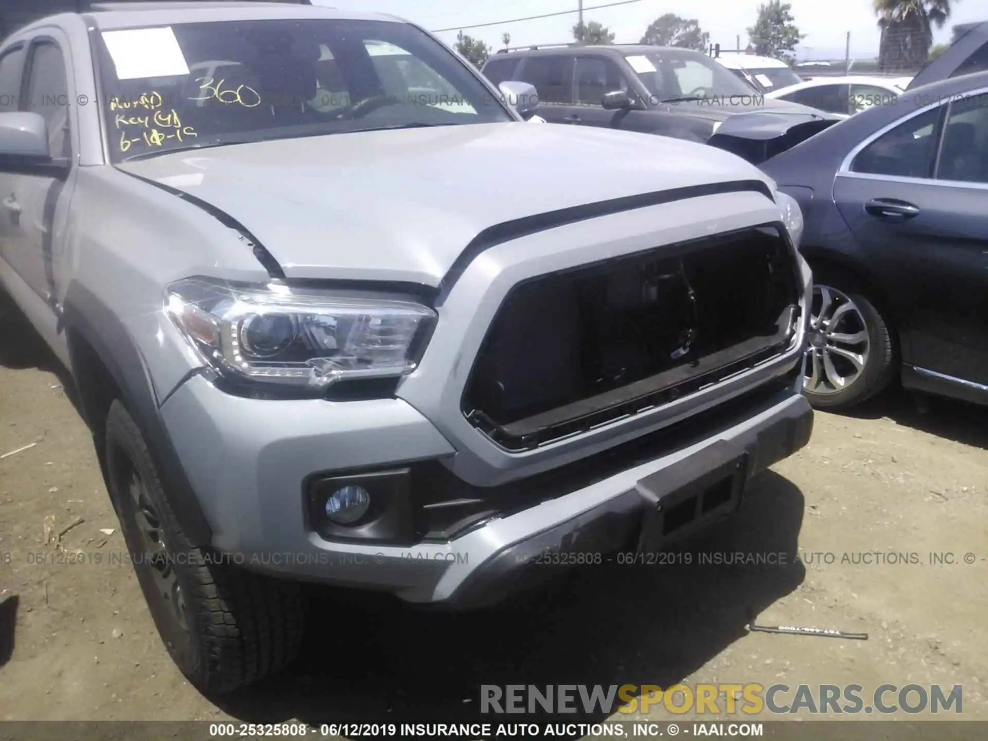 6 Photograph of a damaged car 3TMDZ5BN2KM070774 TOYOTA TACOMA 2019