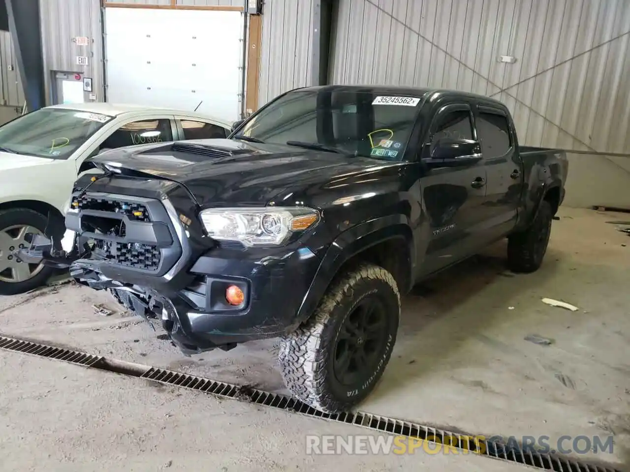 2 Photograph of a damaged car 3TMDZ5BN3KM057371 TOYOTA TACOMA 2019