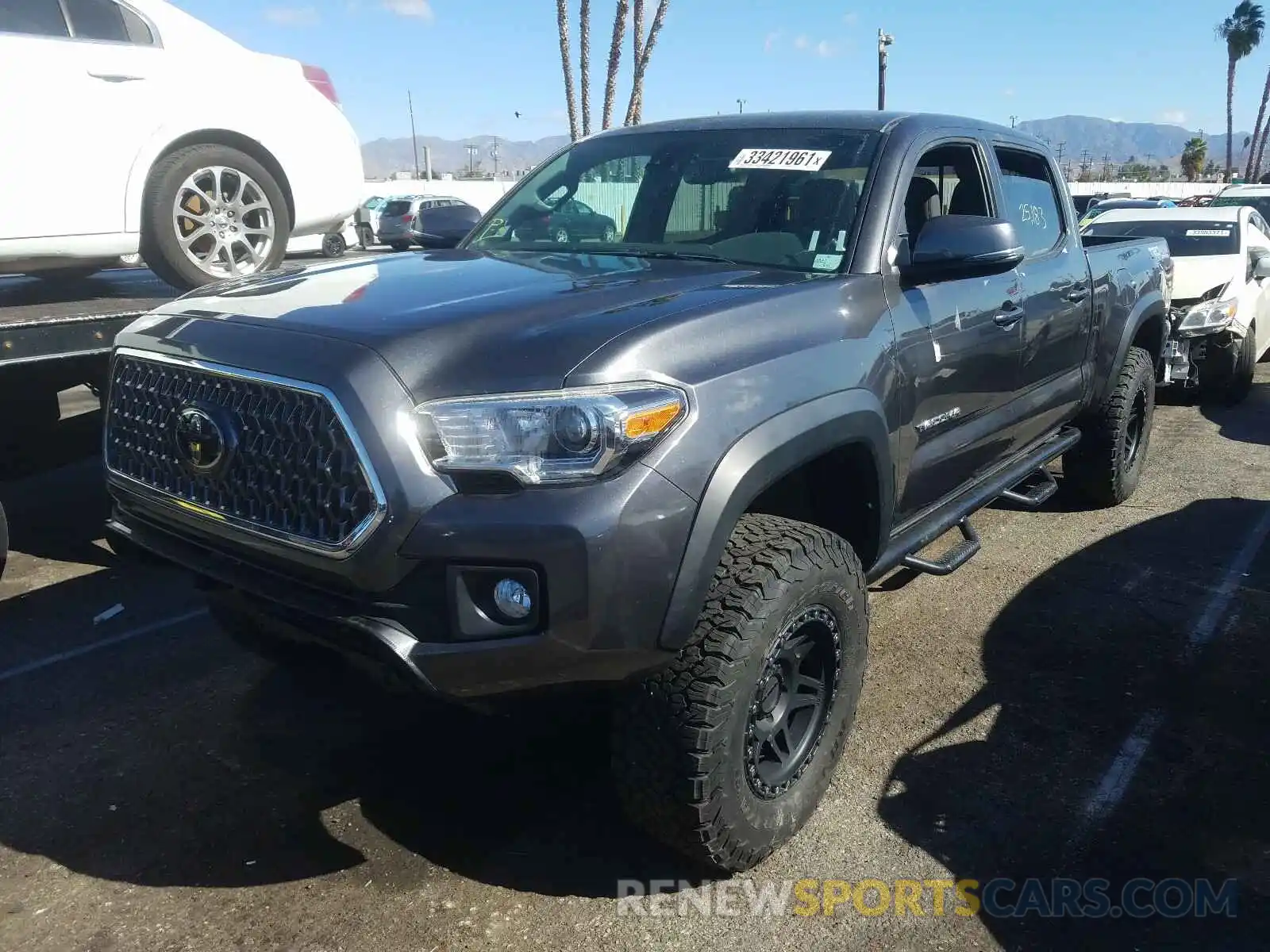 2 Photograph of a damaged car 3TMDZ5BN3KM058195 TOYOTA TACOMA 2019